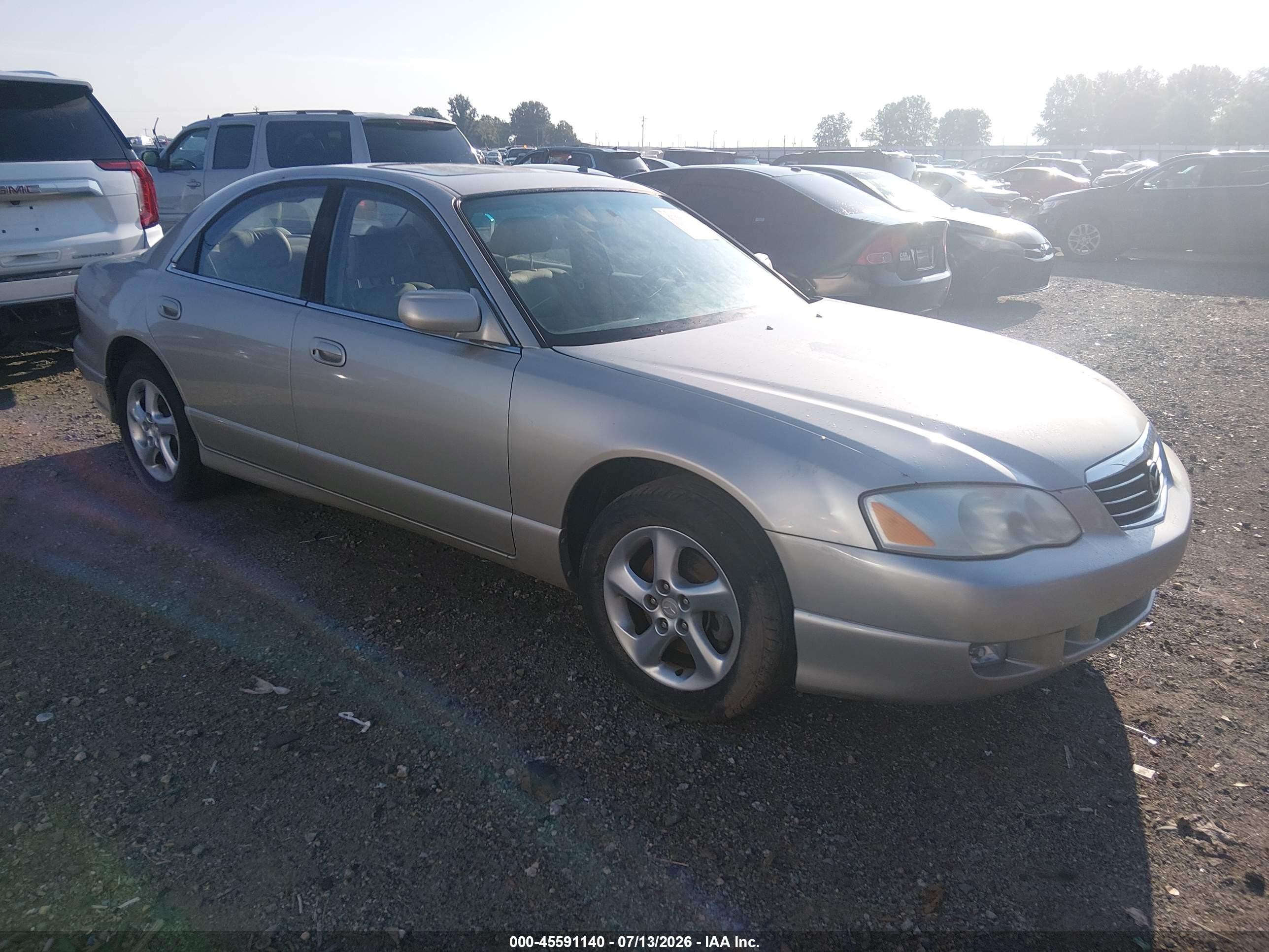 2002 Mazda Millenia P, VIN JM1TA221X21719037 — Normal wear