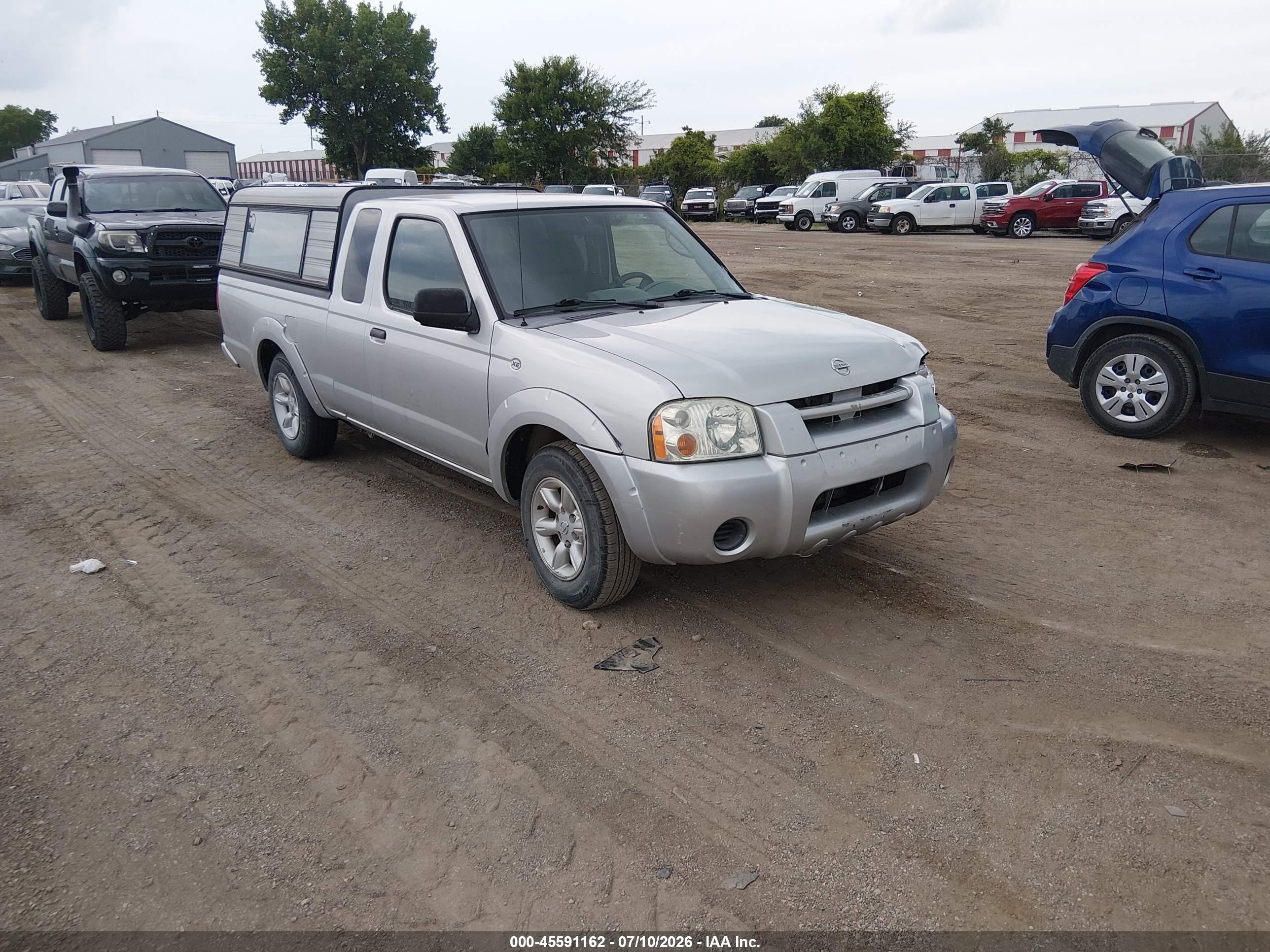 2004 Nissan Frontier, VIN 1N6DD26T74C450149 — Side