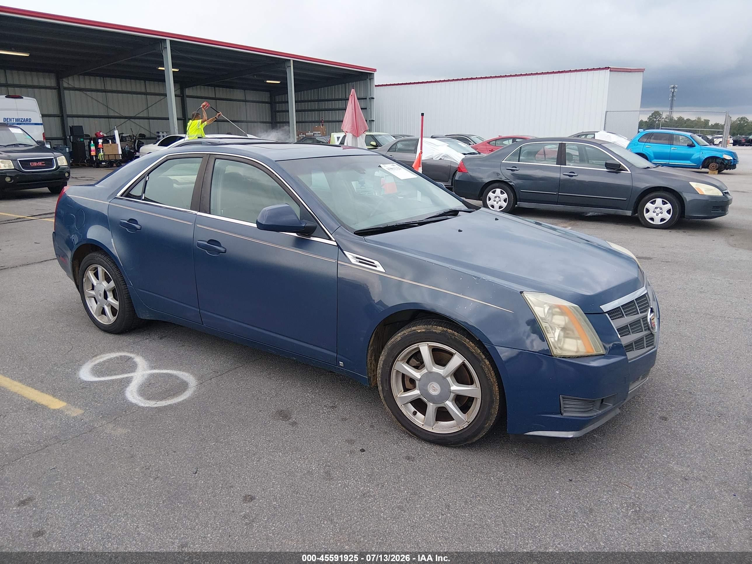 2009 Cadillac CTS RWD, VIN 1G6DF577890128843 — Front end