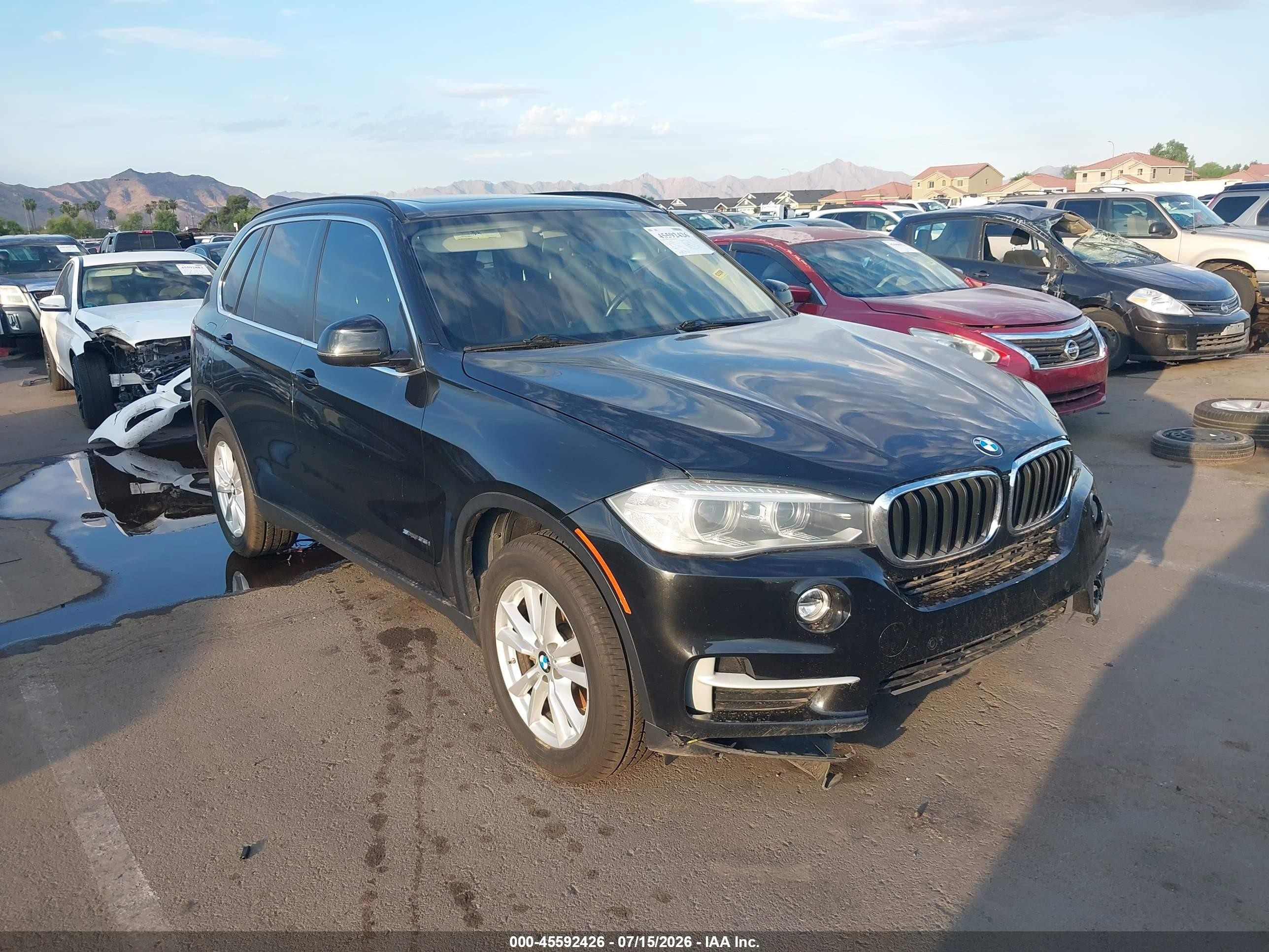 2014 BMW X5 sDrive35i, VIN 5UXKR2C56E0C00102 — Перед