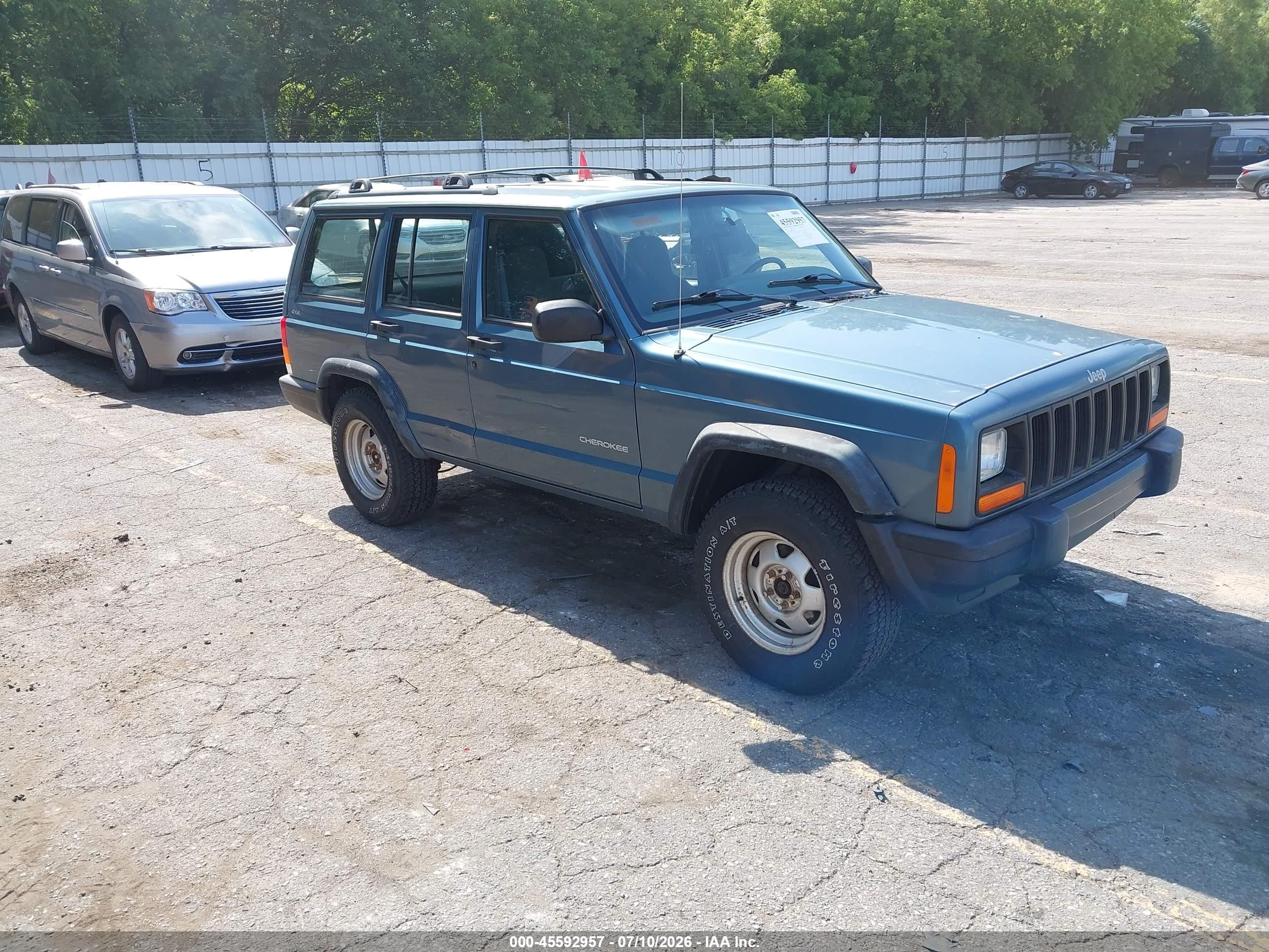 1999 Jeep Cherokee SE, VIN 1J4FF28S5XL523737 — Normal wear