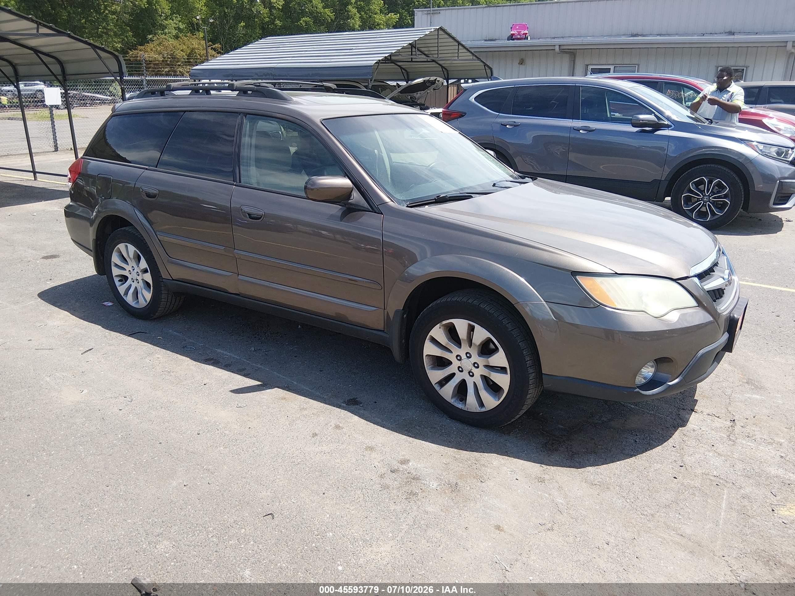 2009 Subaru Outback Limited, VIN 4S4BP66C197344817 — Перед