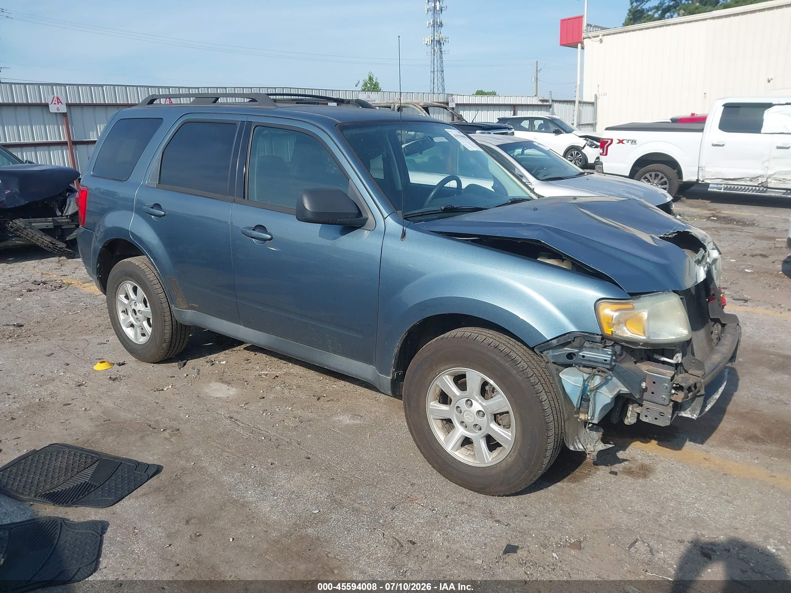 2011 Mazda Tribute Sport, VIN 4F2CY0C72BKM02026 — Front end
