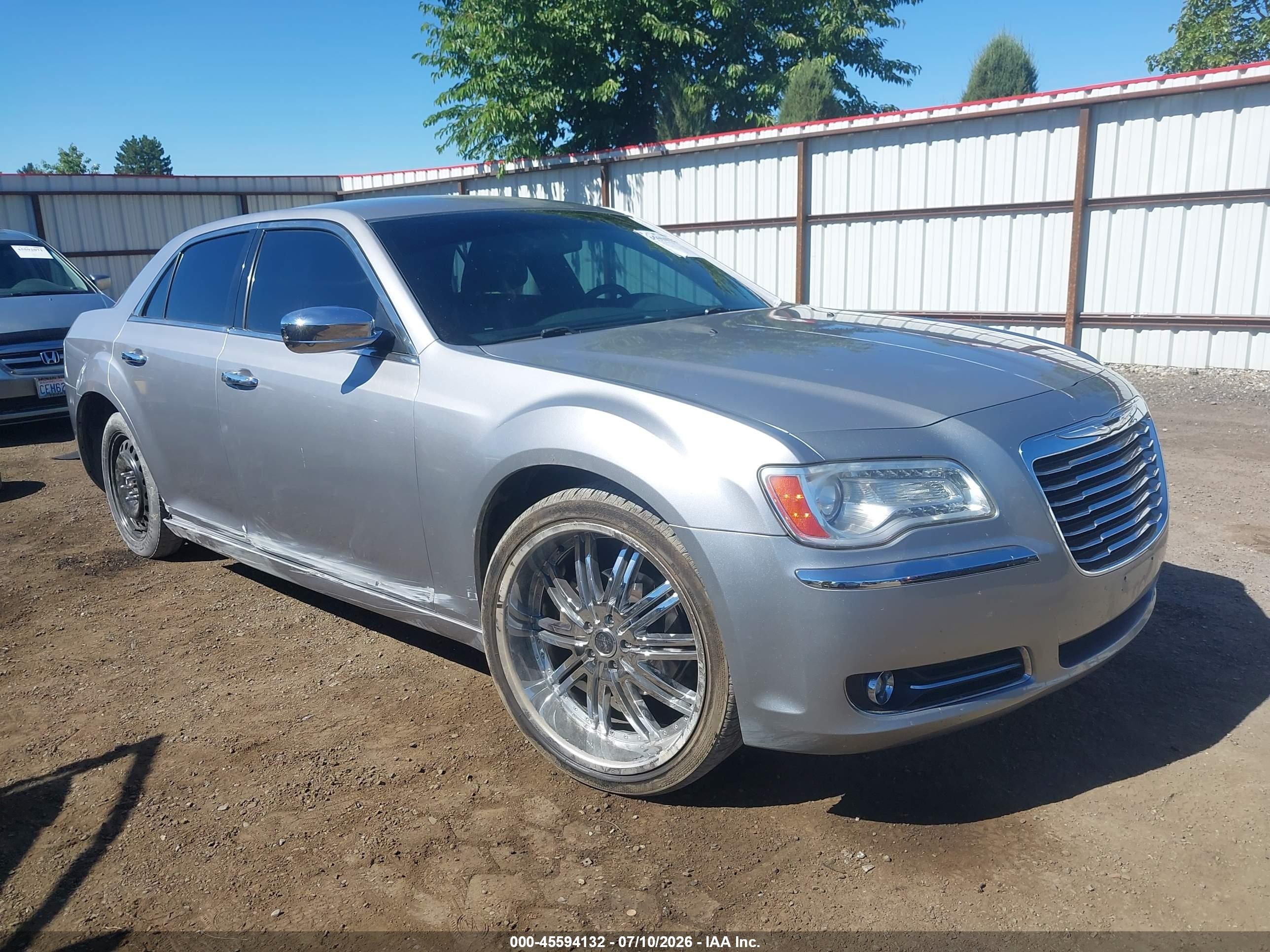 2011 Chrysler 300 Limited, VIN 2C3CA5CG8BH522197 — Side