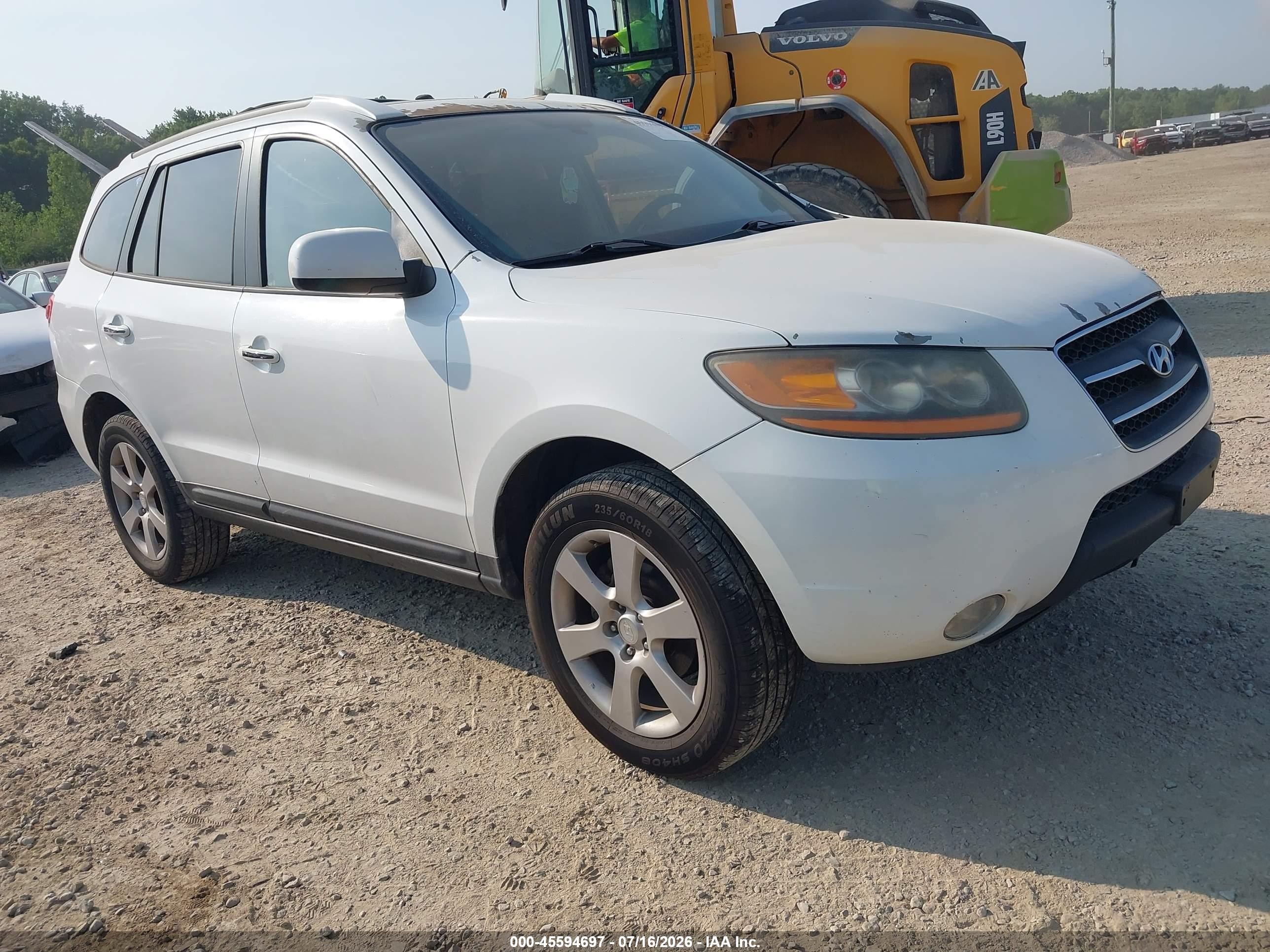 2009 Hyundai Santa Fe SE, VIN 5NMSH13E09H319930 — Front end