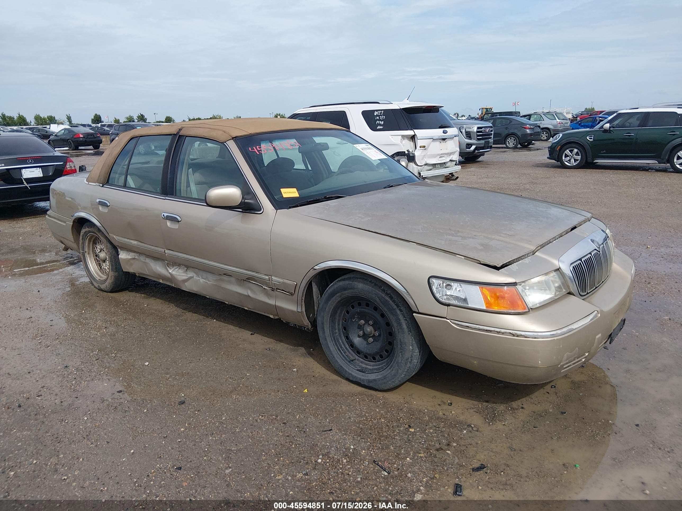 1999 Mercury Grand Marquis GS, VIN 2MEFM74W1XX689577 — Side