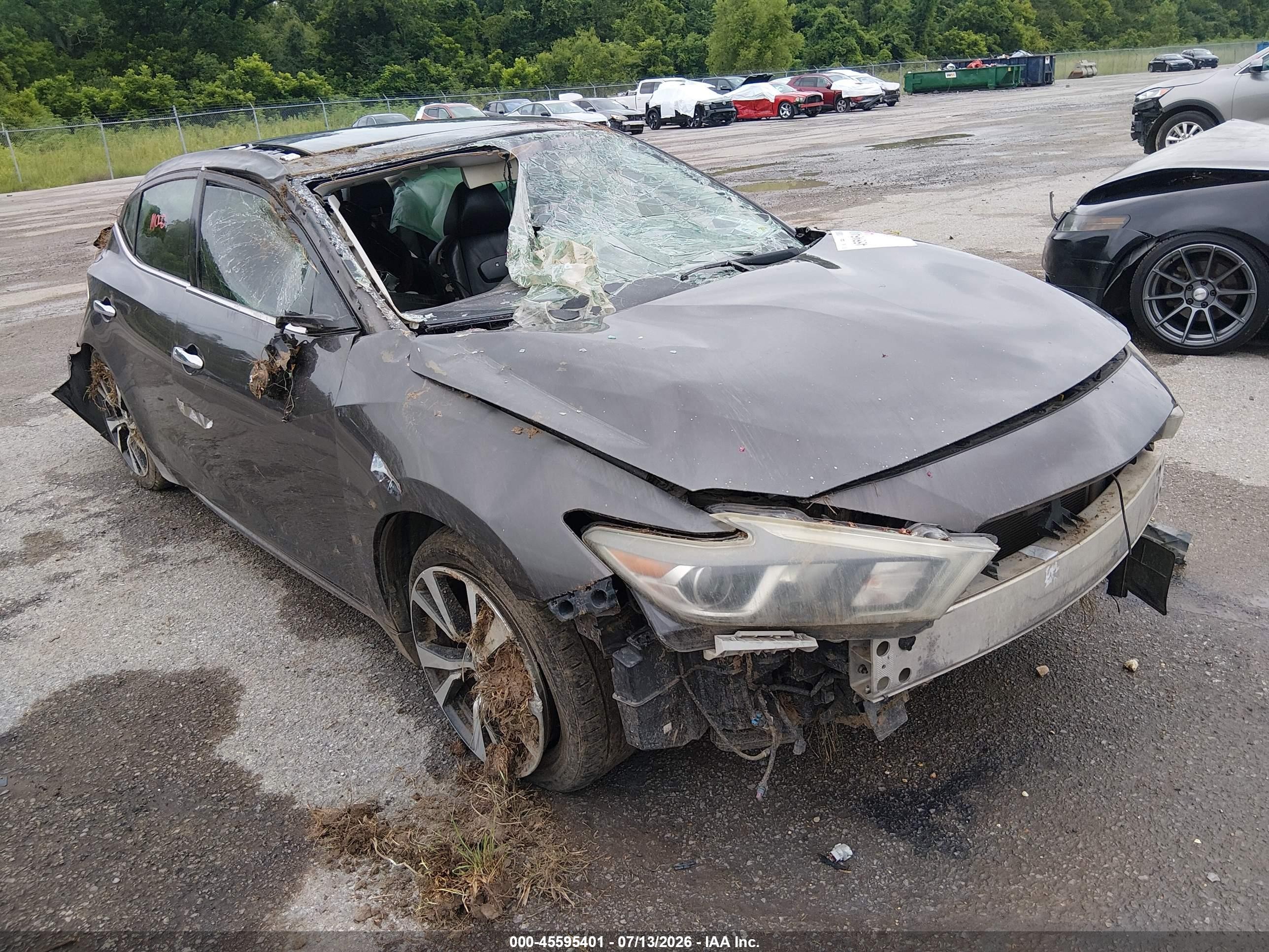 2016 Nissan Maxima SL, VIN 1N4AA6AP0GC404625 — Опрокидывание