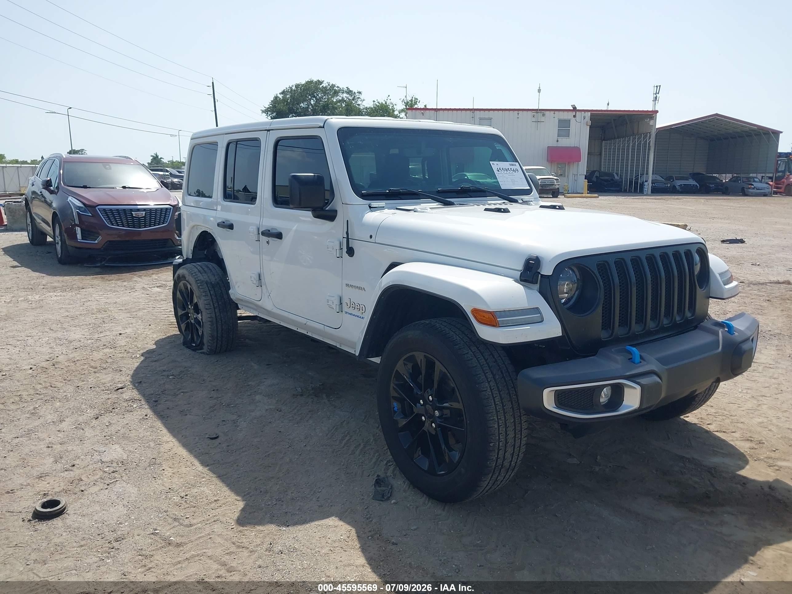 2023 Jeep Wrangler Sahara, VIN 1C4JJXP62PW525203 — Side