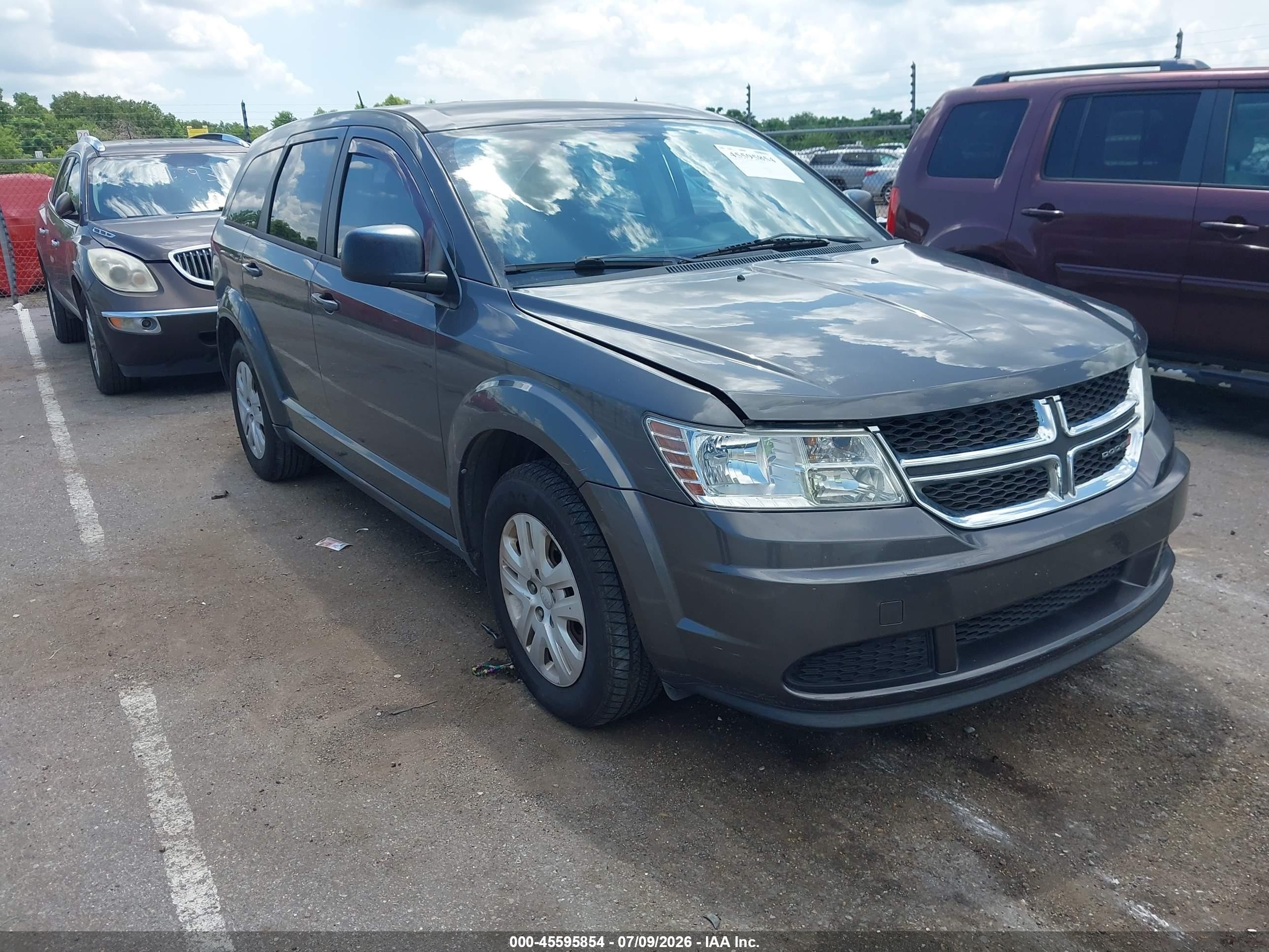 2015 Dodge Journey American Value, VIN 3C4PDCAB8FT559747 — Side