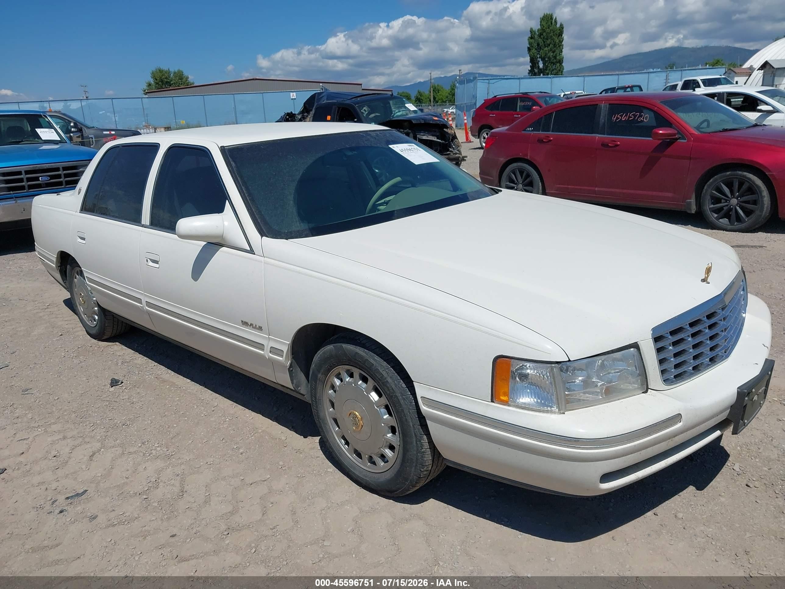 1999 Cadillac DeVille, VIN 1G6KD54Y6XU775807 — Normal wear