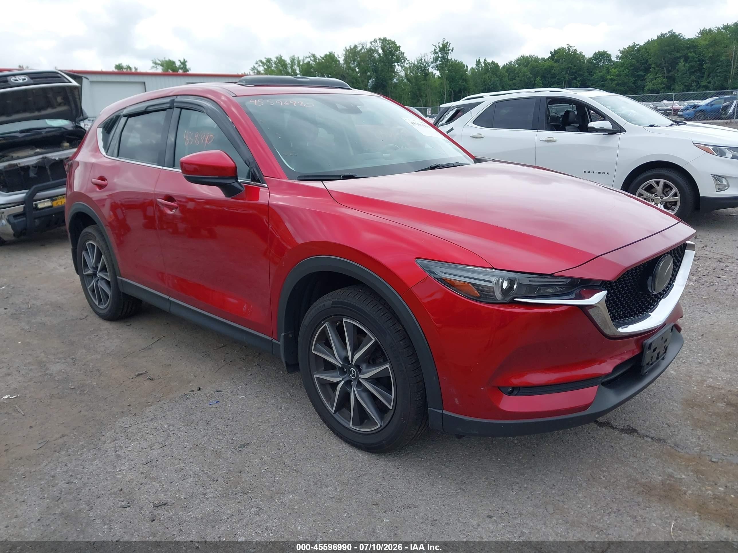 2018 Mazda CX-5 Grand Touring, VIN JM3KFBDM2J0379365 — Storm