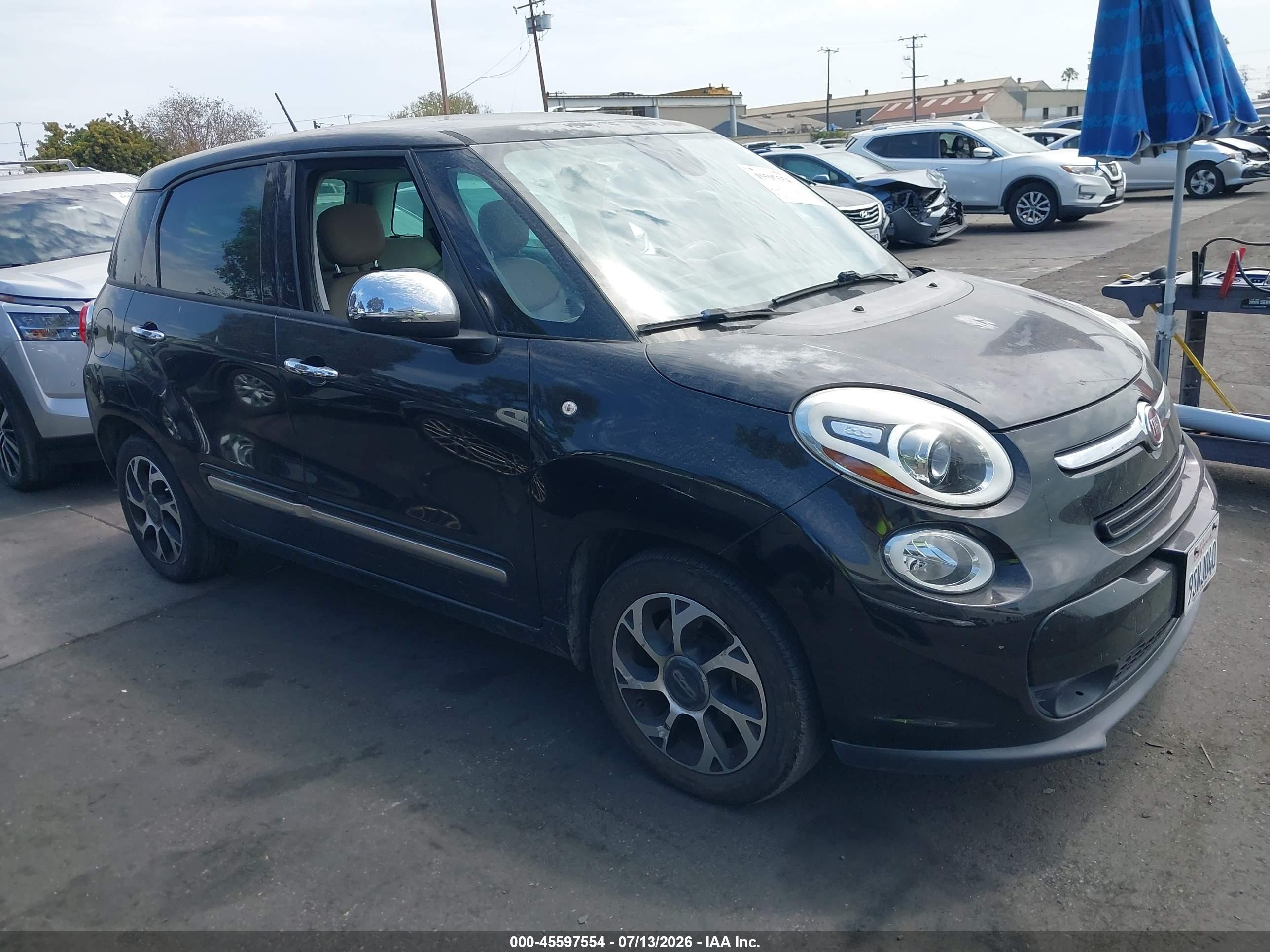 2014 FIAT 500L Lounge, VIN ZFBCFACH3EZ005153 — Side