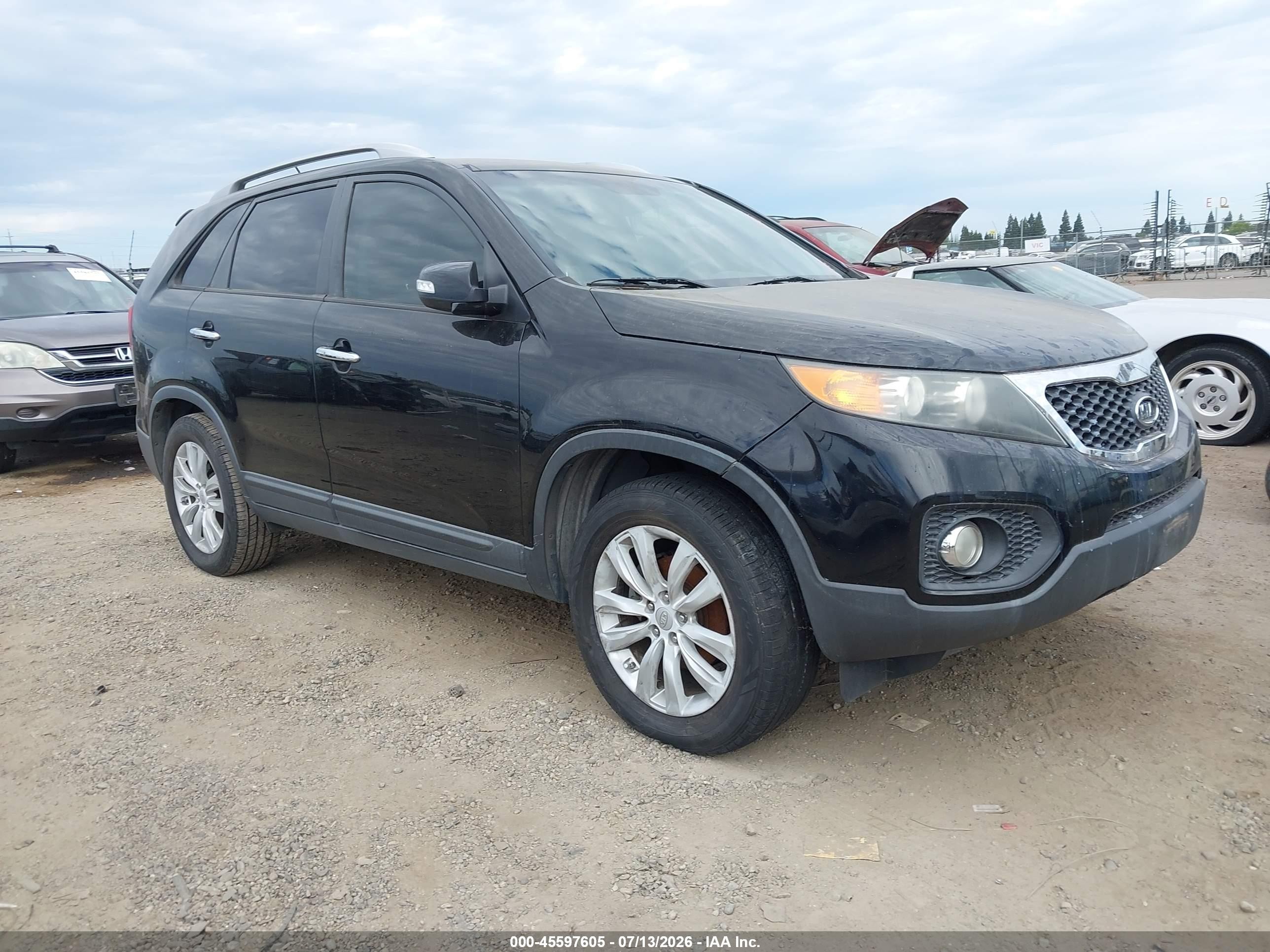 2011 Kia Sorento EX, VIN 5XYKU4A2XBG038224 — Normal wear