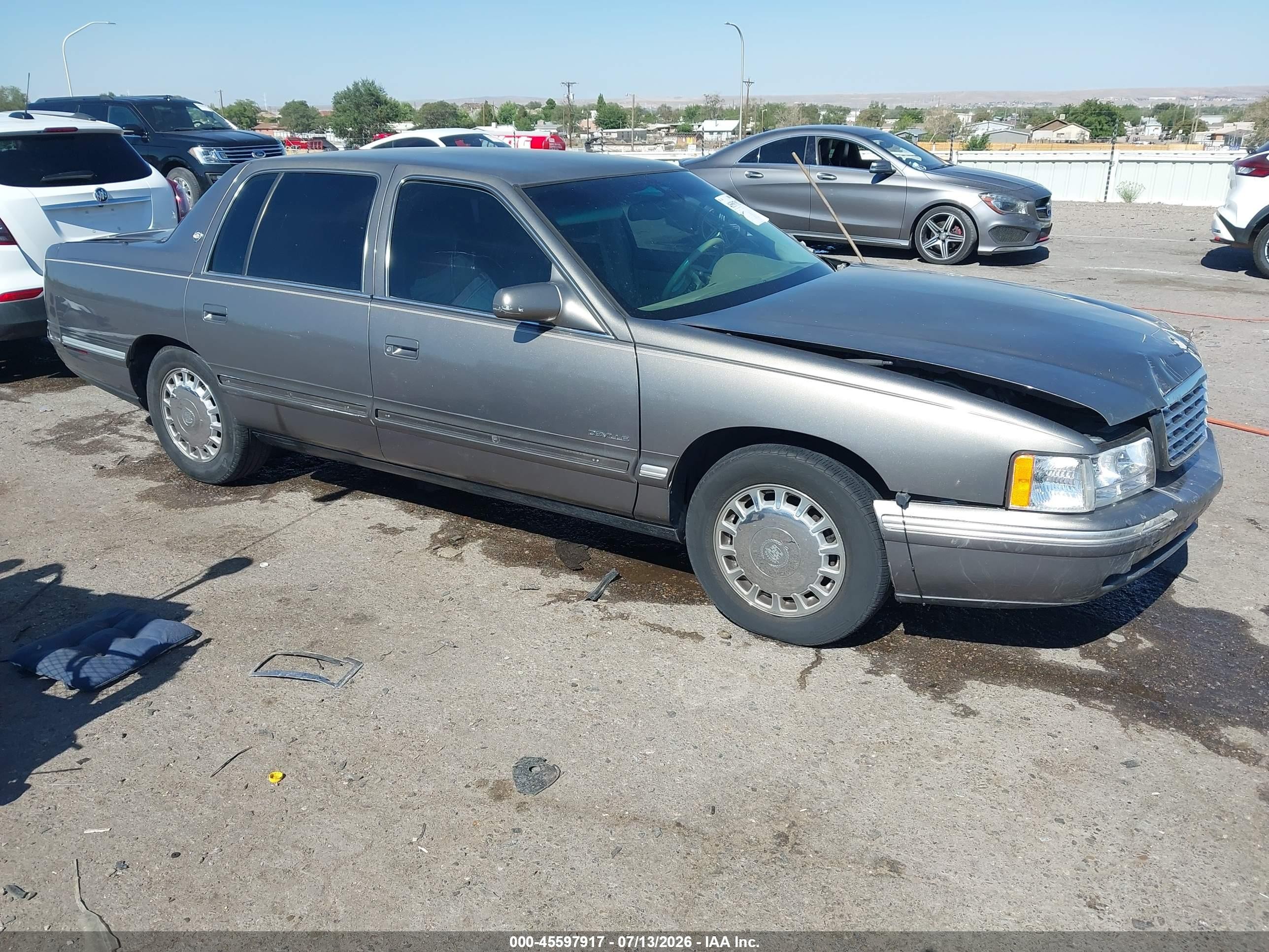 1999 Cadillac DeVille, VIN 1G6KD54Y1XU740978 — Normal wear