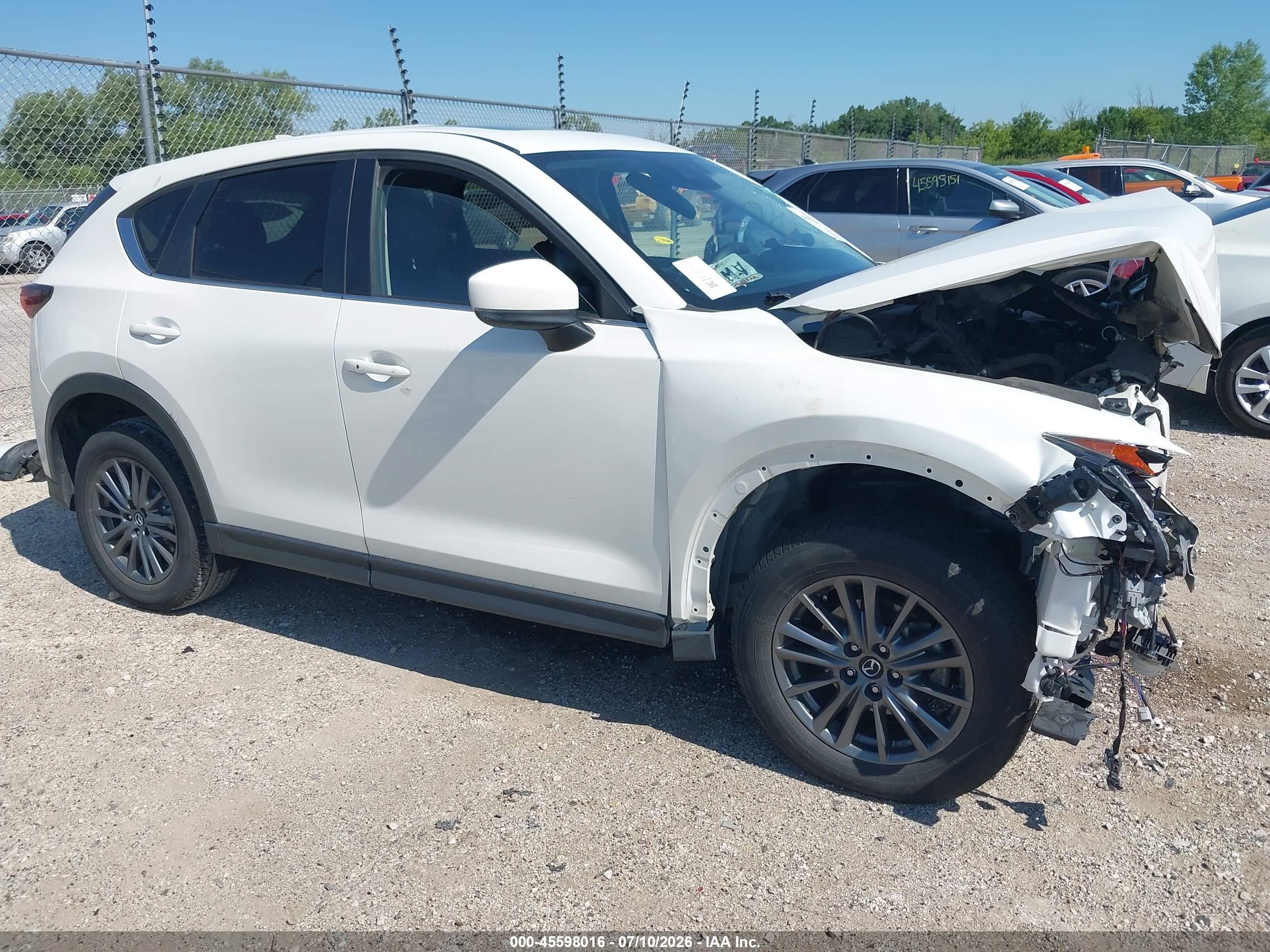 2021 Mazda CX-5 Touring, VIN JM3KFBCM5M0359293 — Front end
