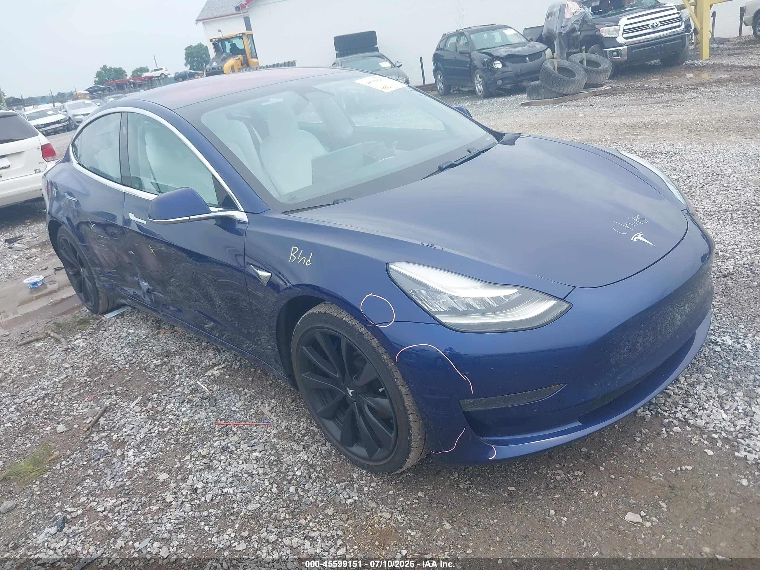 2018 Tesla Model 3 Long Range Battery, VIN 5YJ3E1EB2JF056121 — Side