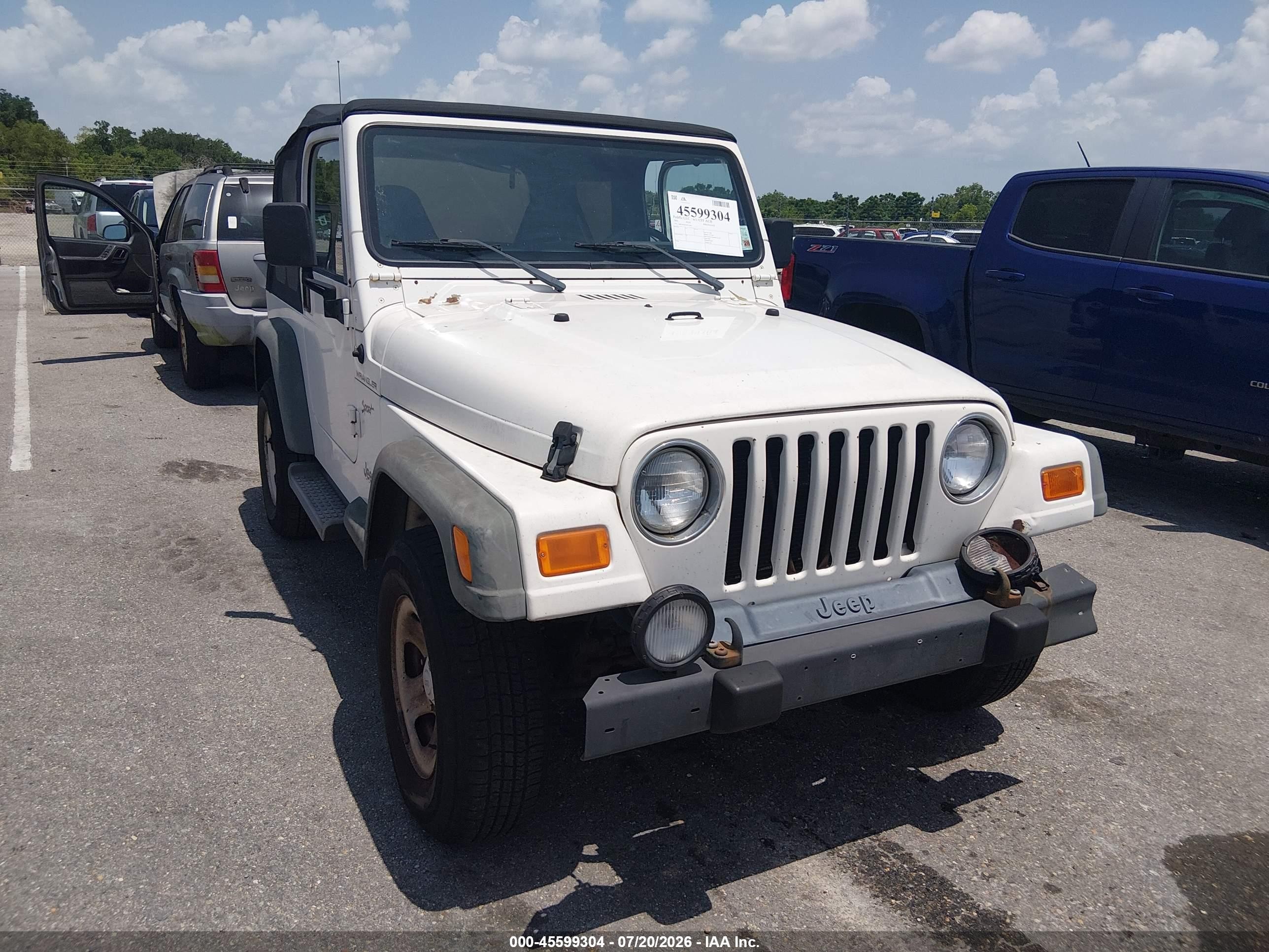 2002 Jeep Wrangler Sport, VIN 1J4FA49S52P771870 — Normal wear