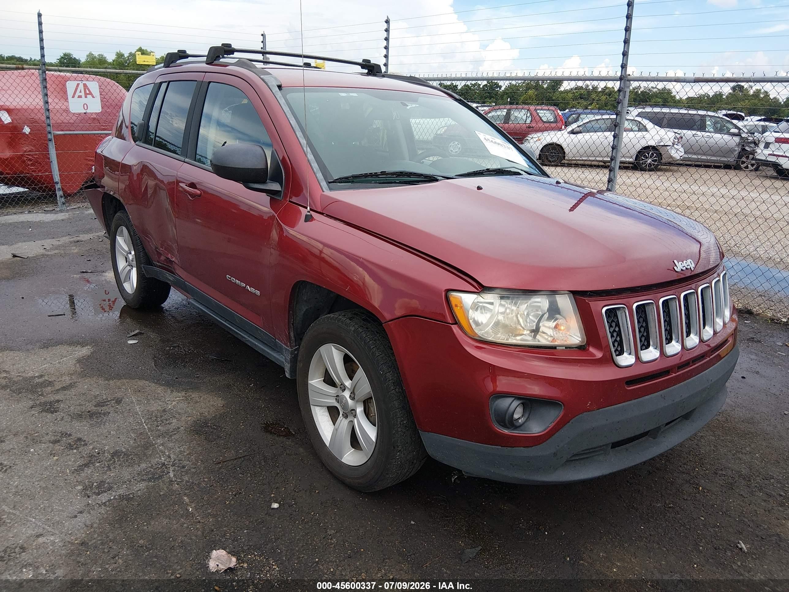 2014 Jeep Compass Sport, VIN 1C4NJDBB2ED855341 — Side