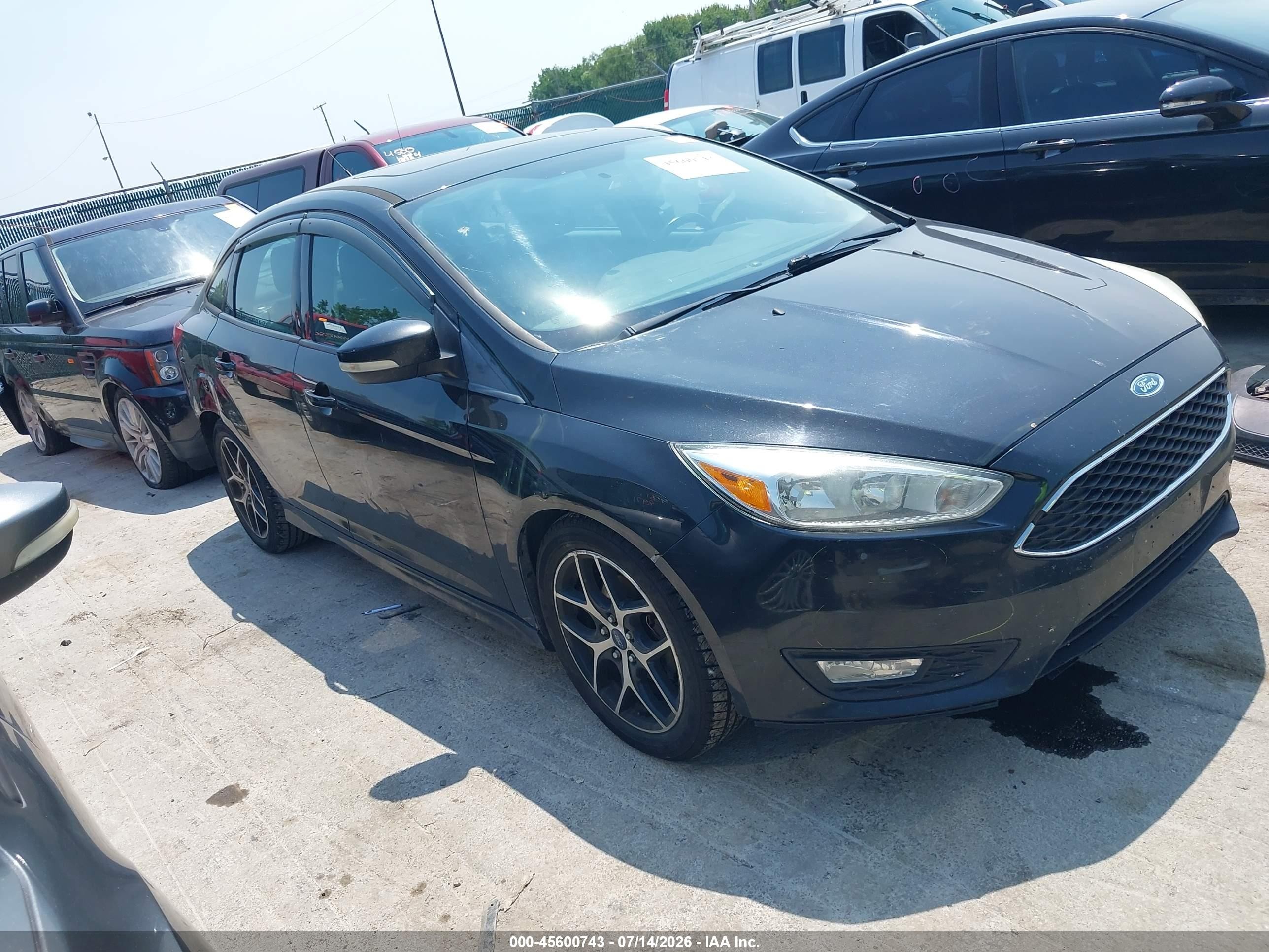 2015 Ford Focus SE, VIN 1FADP3F23FL216963 — Rear end