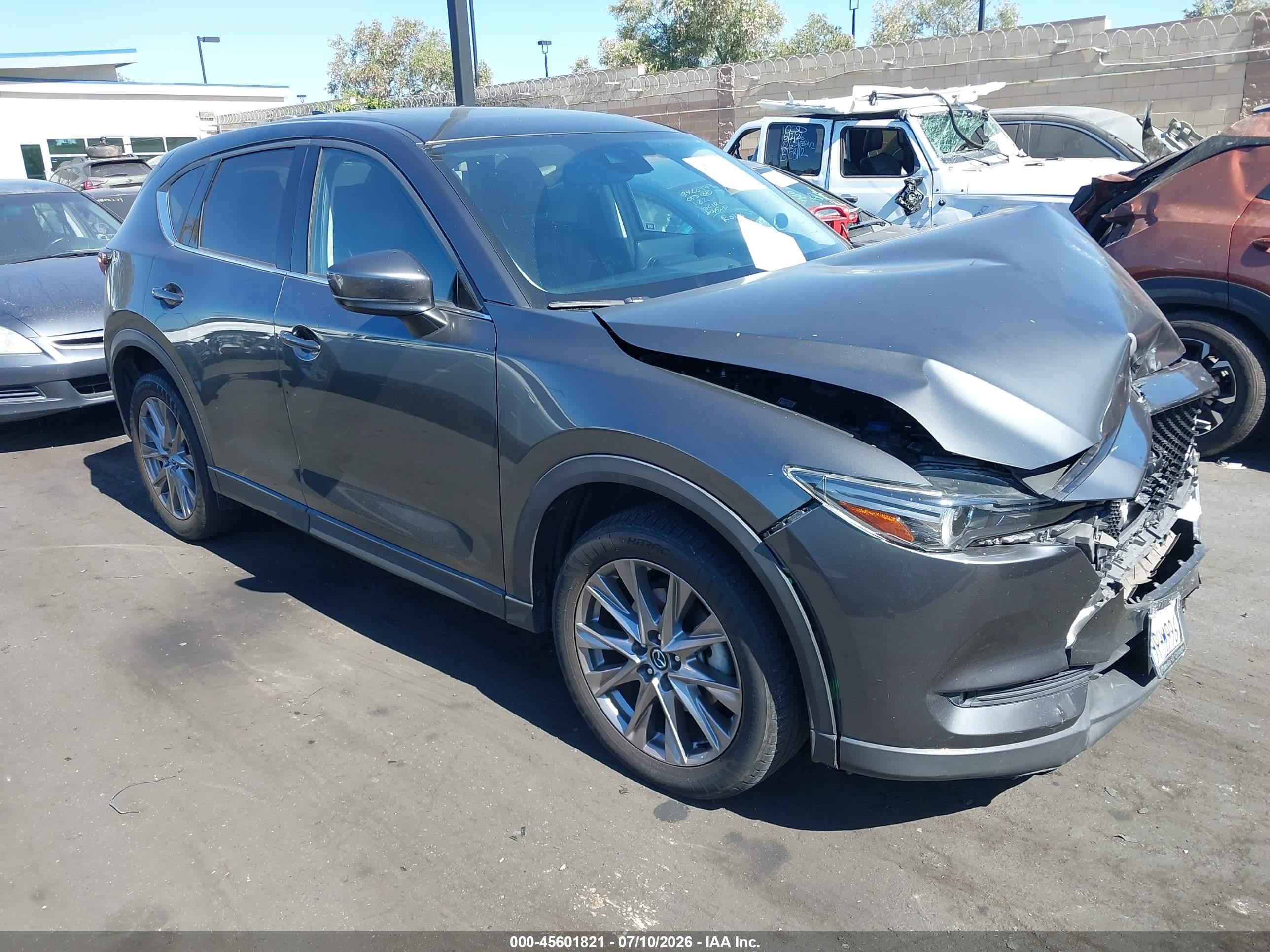 2021 Mazda CX-5 Grand Touring Reserve, VIN JM3KFBAY5M0422432 — Front end