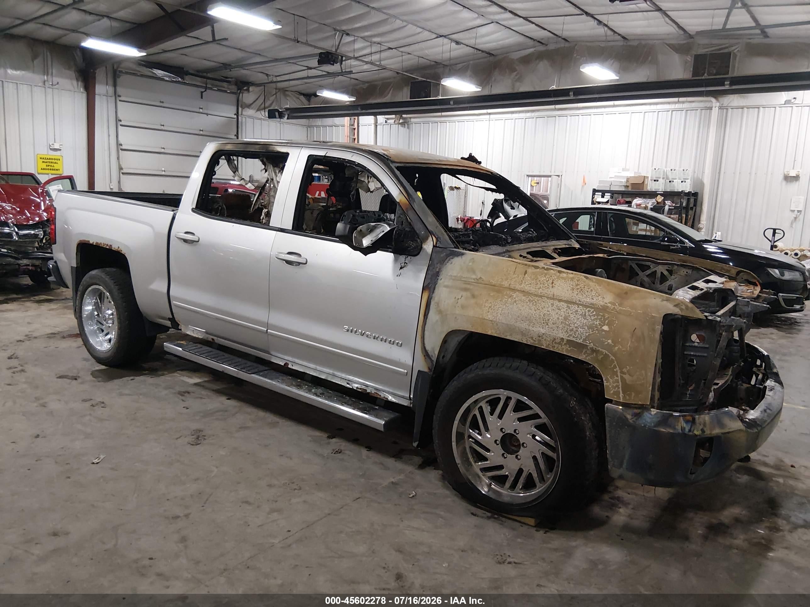 2016 Chevrolet Silverado 1500 LT, VIN 3GCUKREC4GG374409 — Engine fire