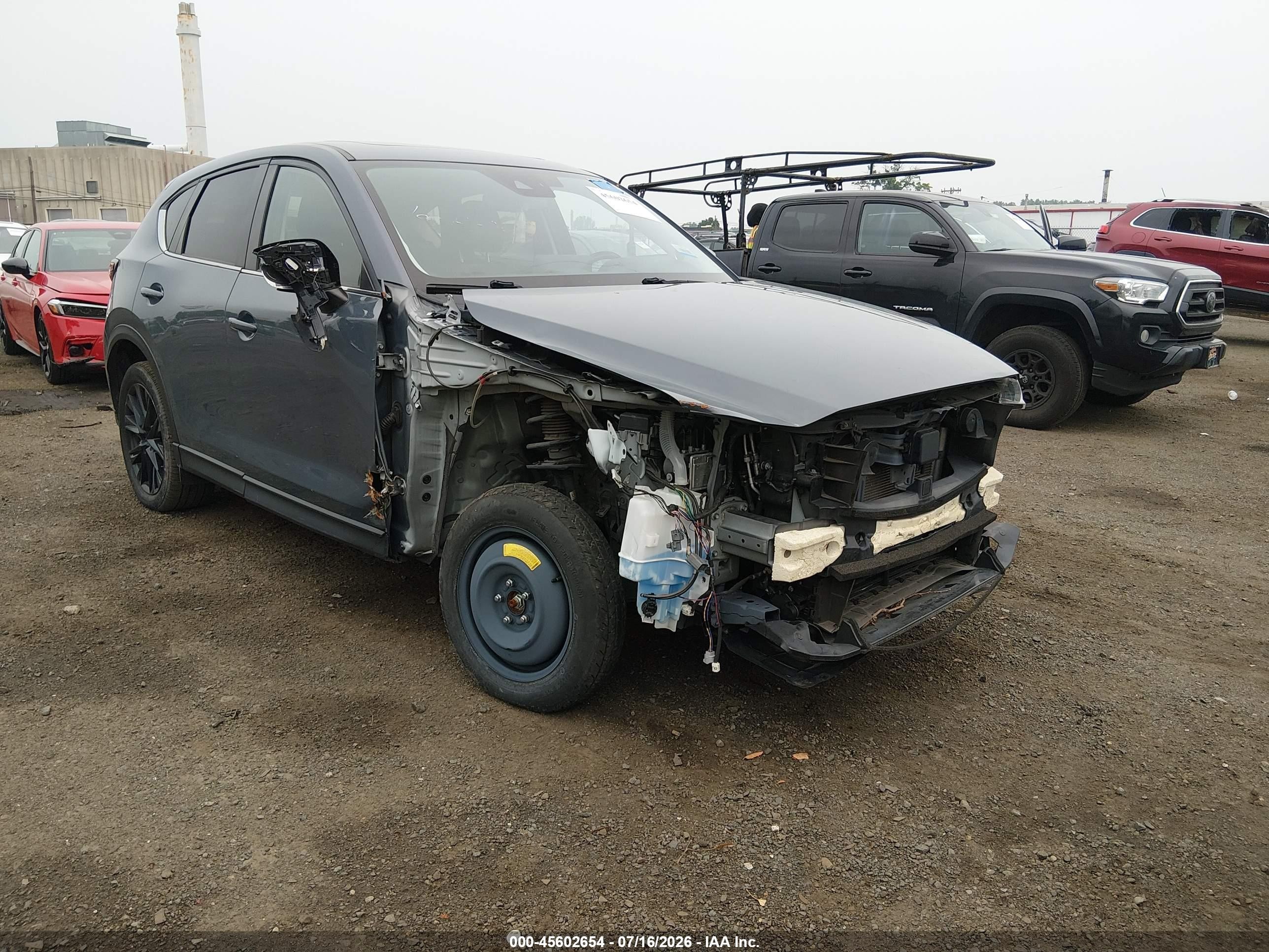 2021 Mazda CX-5 Touring, VIN JM3KFBCM2M0430126 — Front end