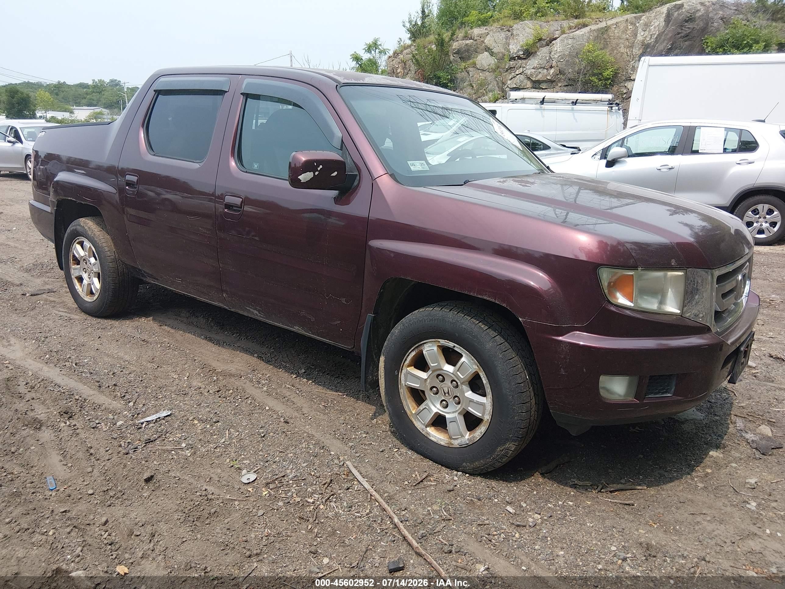 2011 Honda Ridgeline RTS, VIN 5FPYK1F49BB005626 — Normal wear