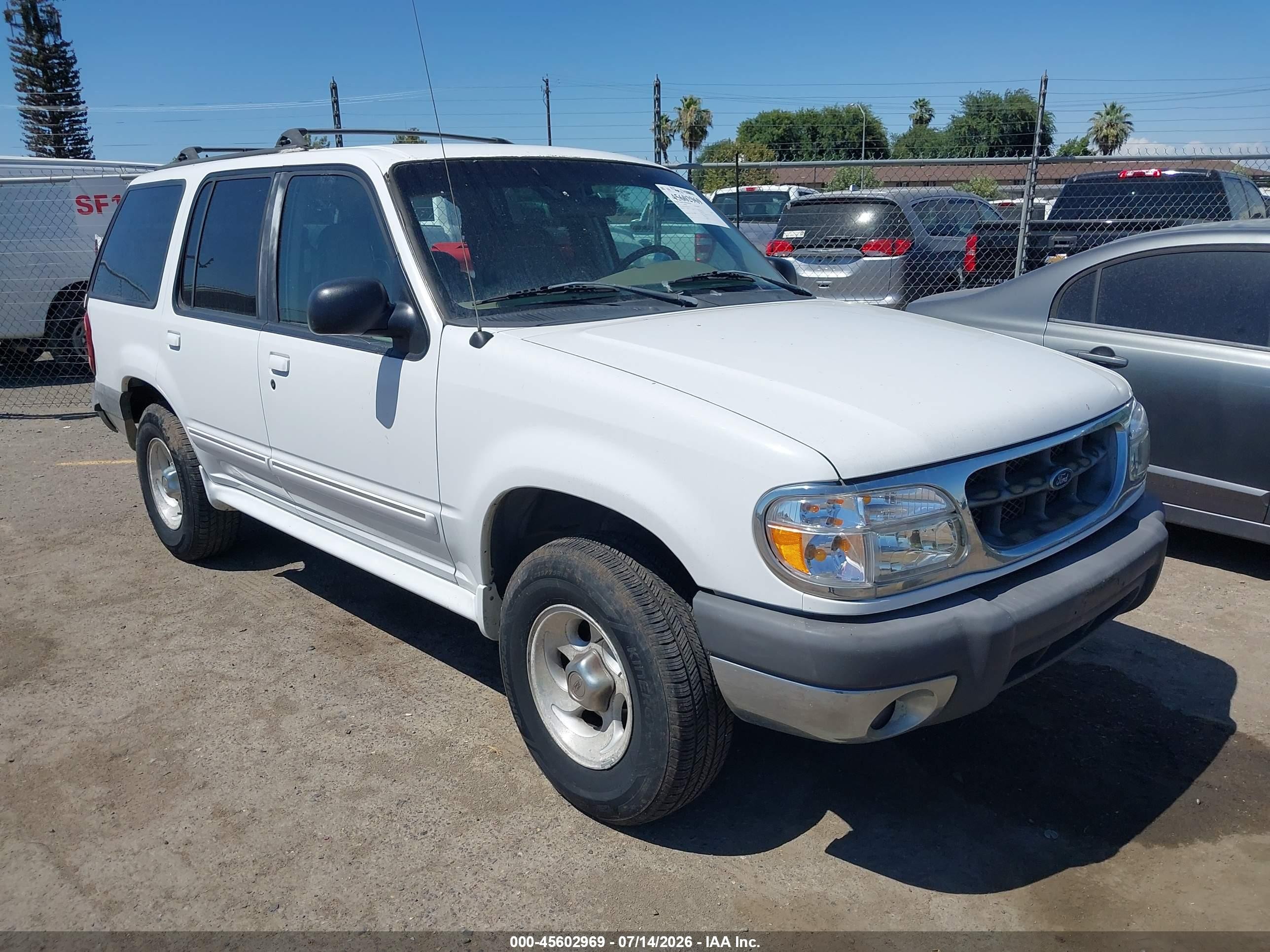 1999 Ford Explorer XLT, VIN 1FMZU32E4XZA83455 — Зад