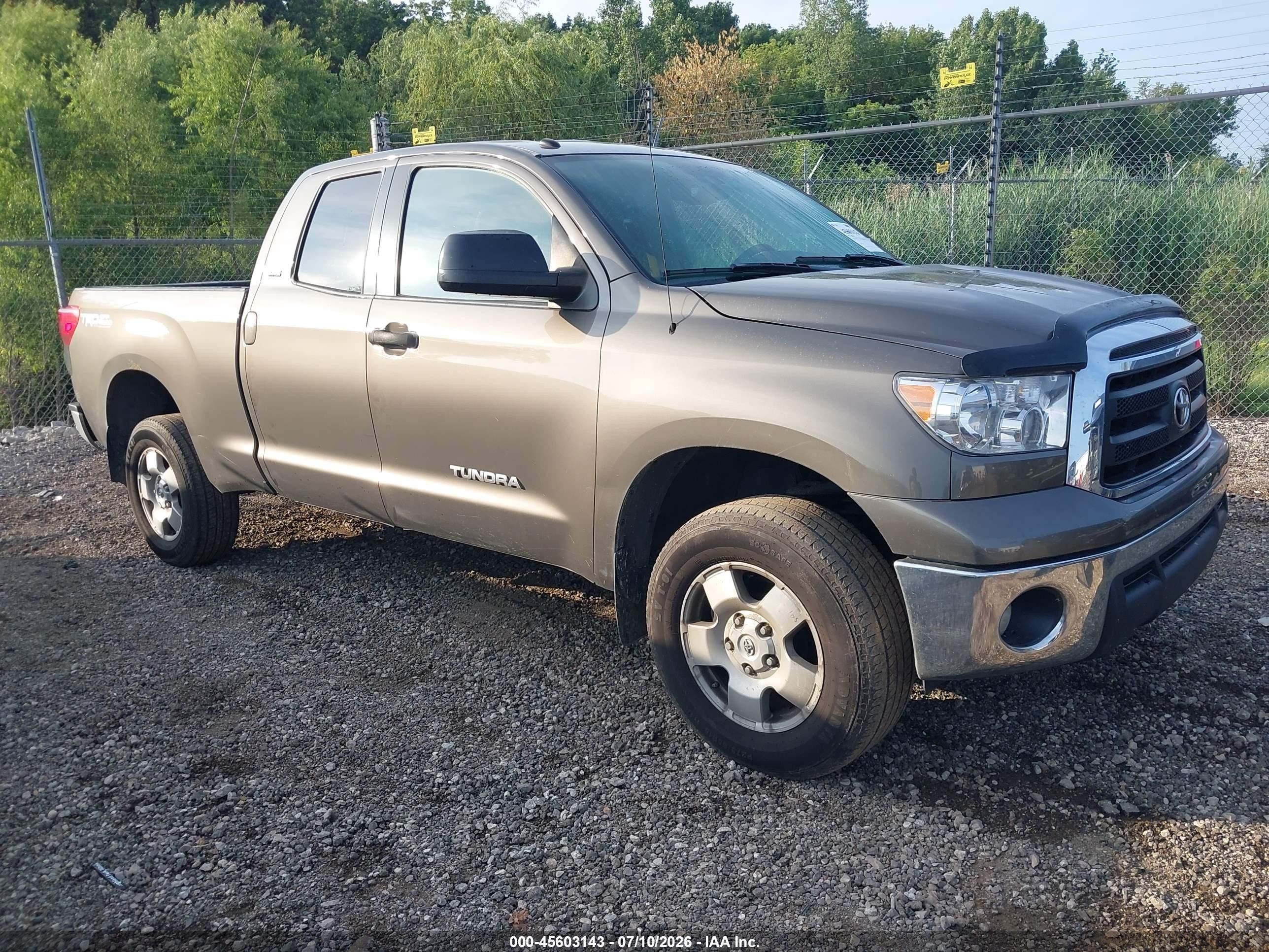 2011 Toyota Tundra, VIN 5TFUM5F11BX024787 — Side