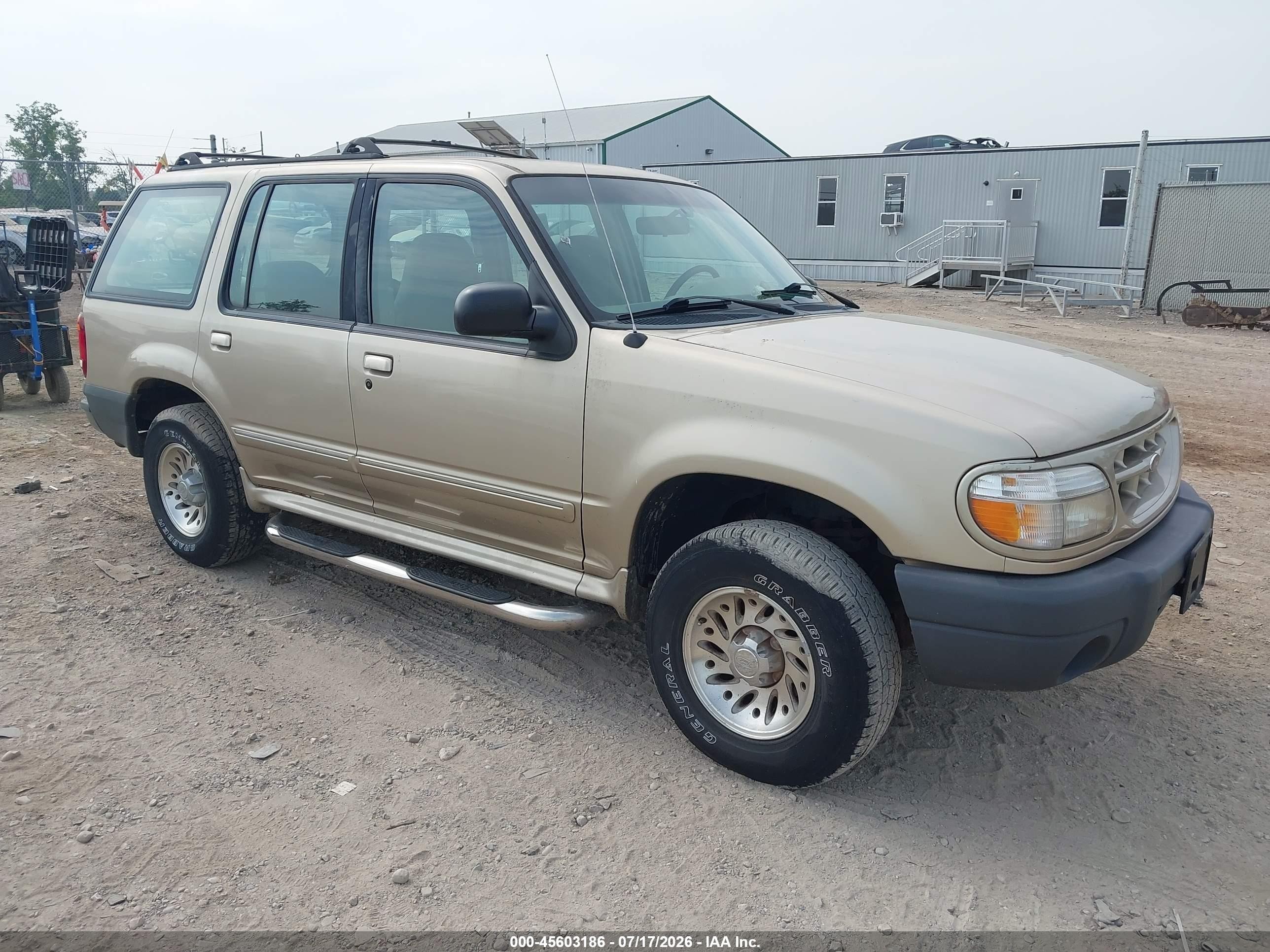 1999 Ford Explorer XL, VIN 1FMZU34X2XUB50565 — Бок