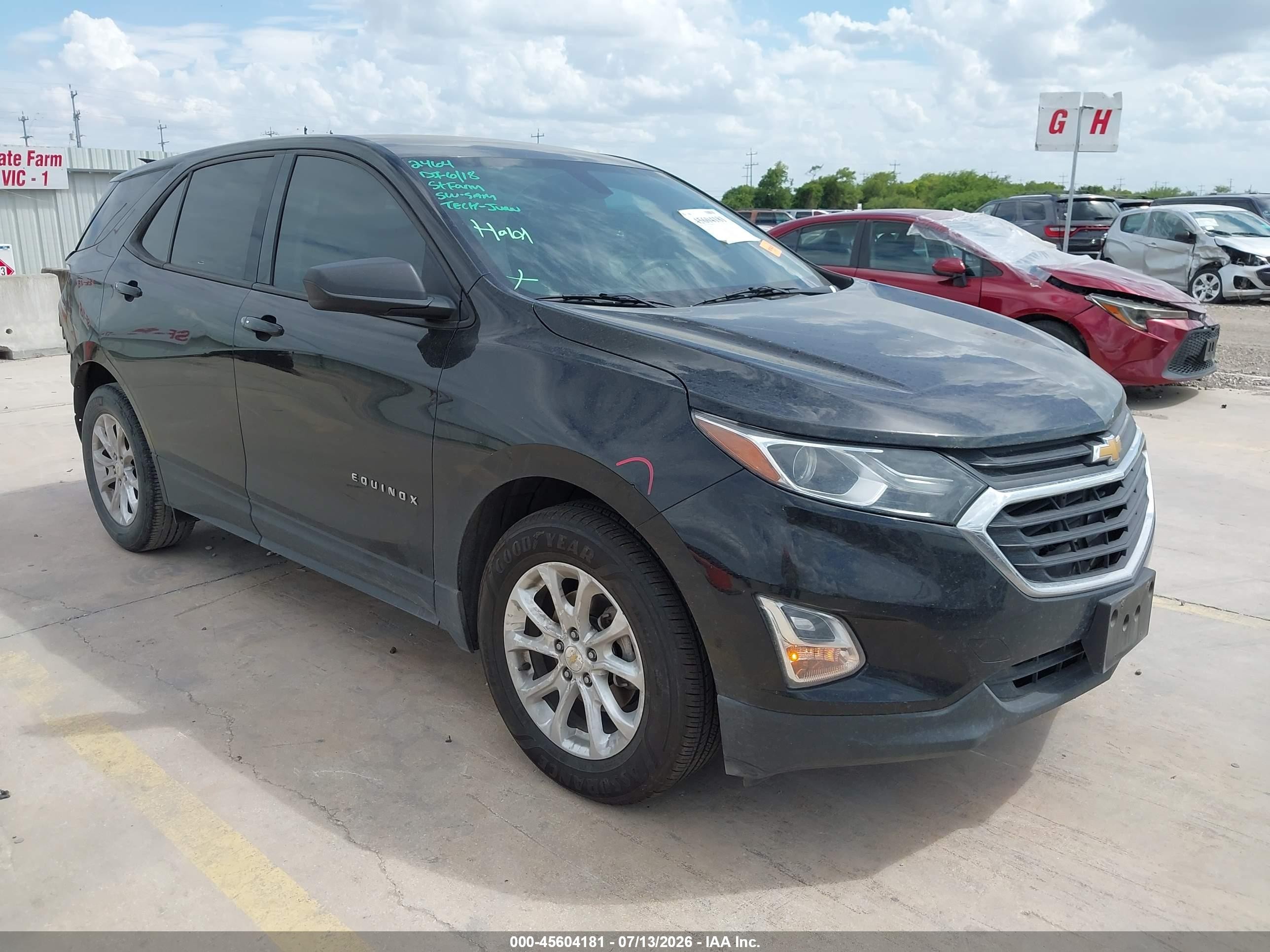 2018 Chevrolet Equinox LS, VIN 2GNAXHEV6J6339445 — Rear end