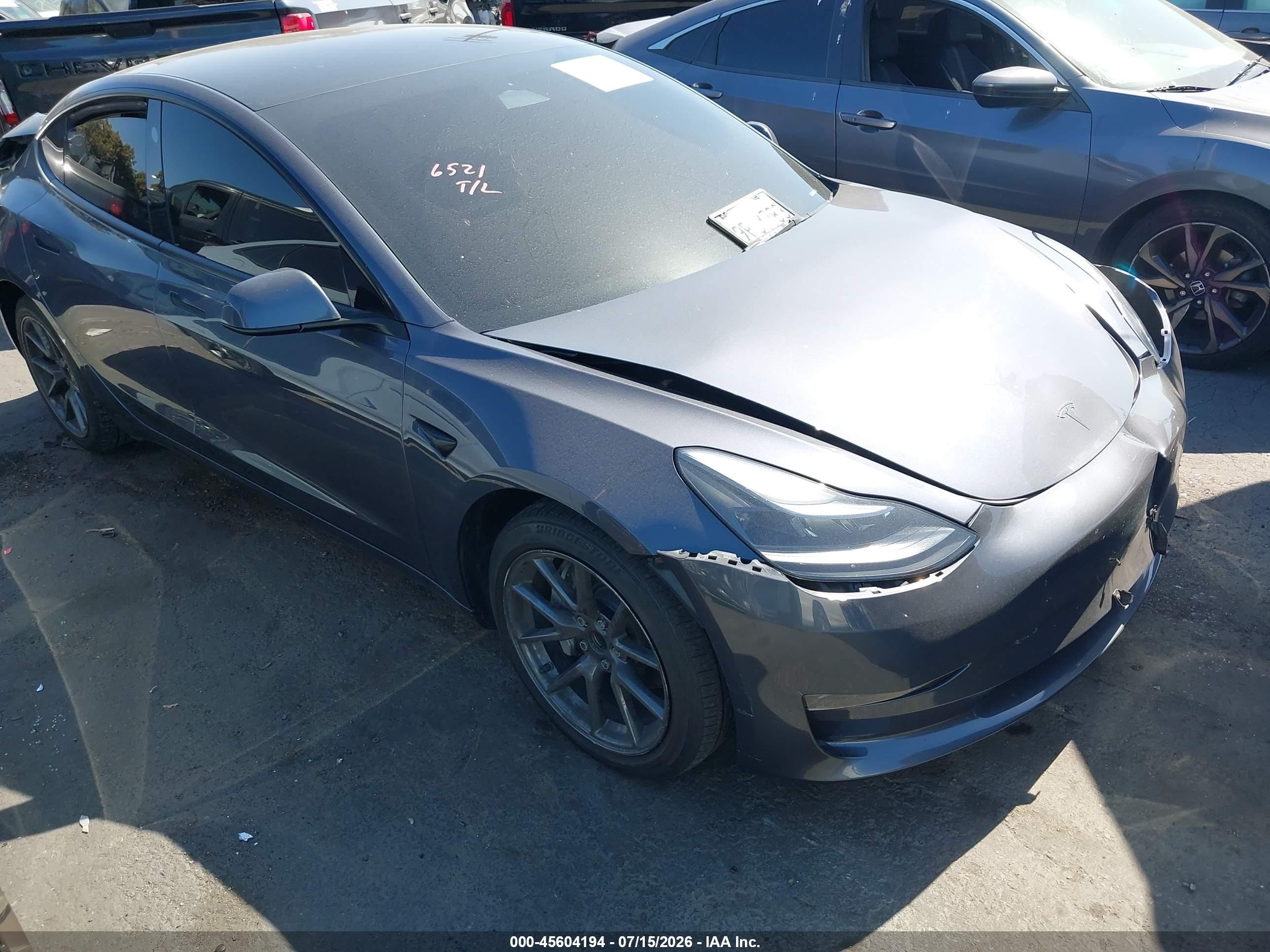 2023 Tesla Model 3, VIN 5YJ3E1EA3PF585299 — Rear end