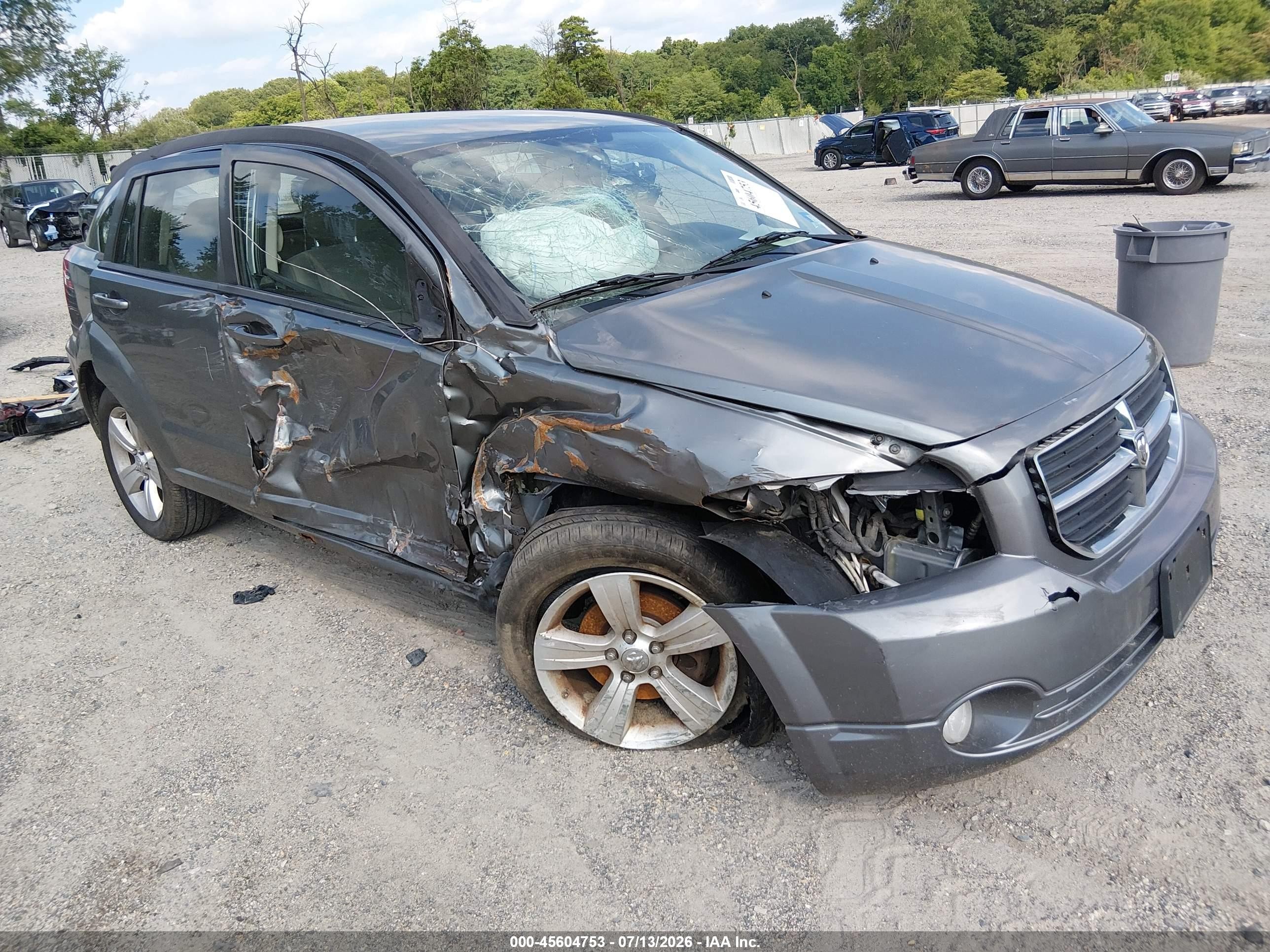 2012 Dodge Caliber SXT, VIN 1C3CDWDA0CD535788 — Side