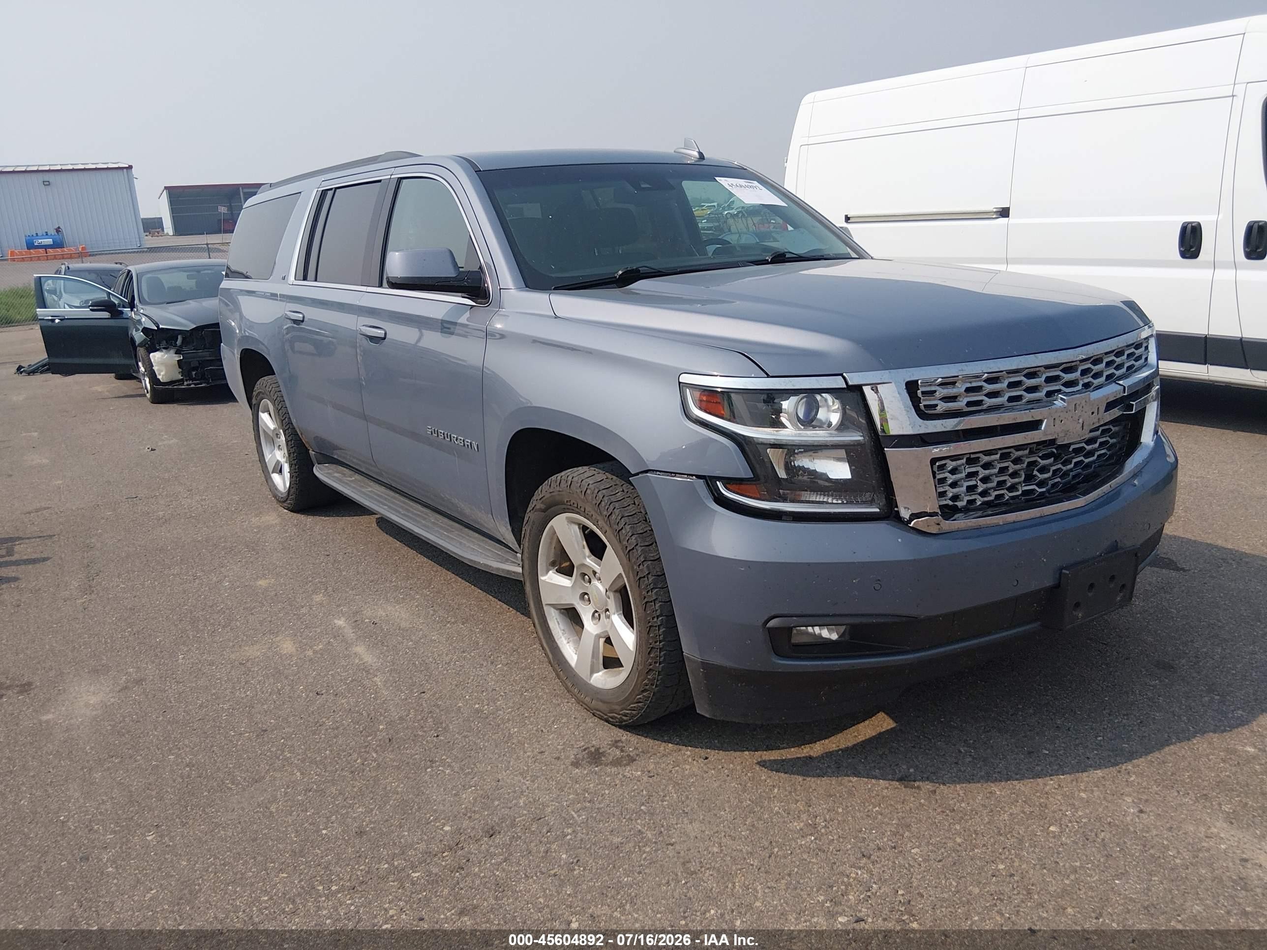 2015 Chevrolet Suburban LT, VIN 1GNSKJKC2FR745862 — Front end