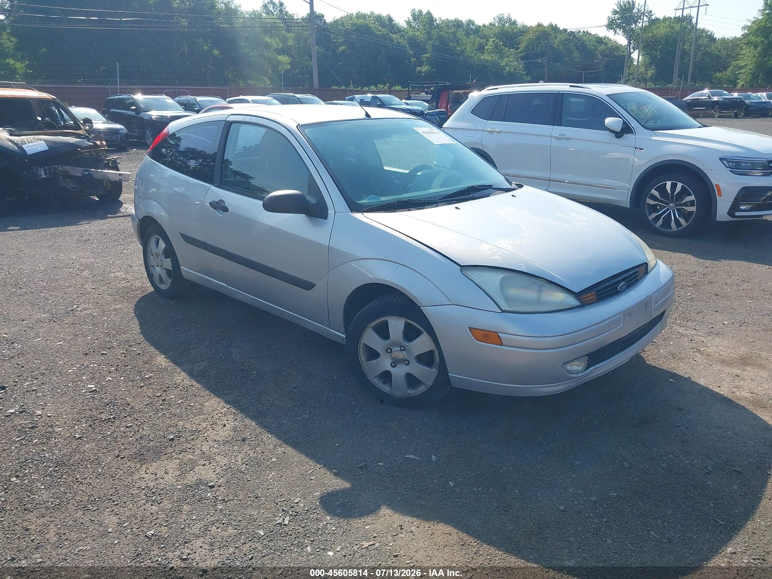 2001 Ford Focus ZX3, VIN 3FAFP31301R243640 — Бок