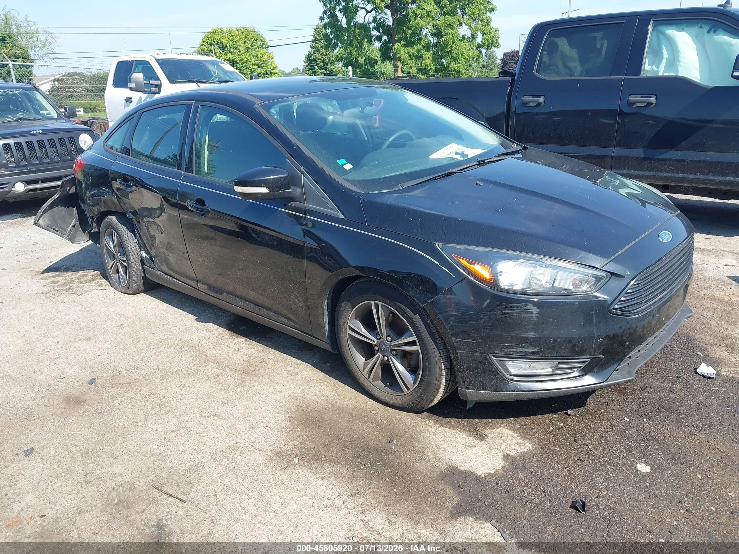 2018 Ford Focus SE, VIN 1FADP3F24JL216091 — Rear end