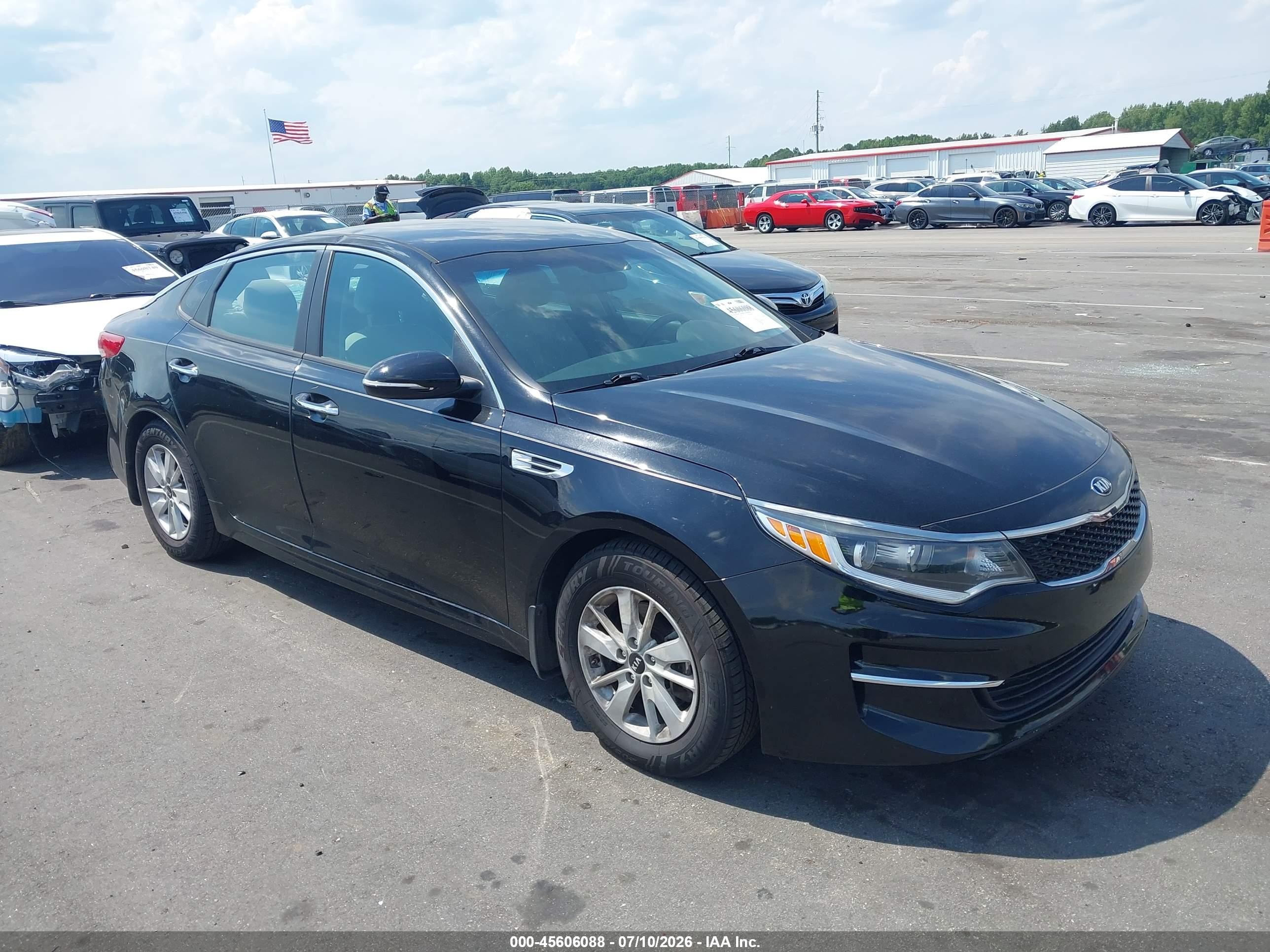2016 Kia Optima LX, VIN 5XXGT4L32GG113170 — Storm