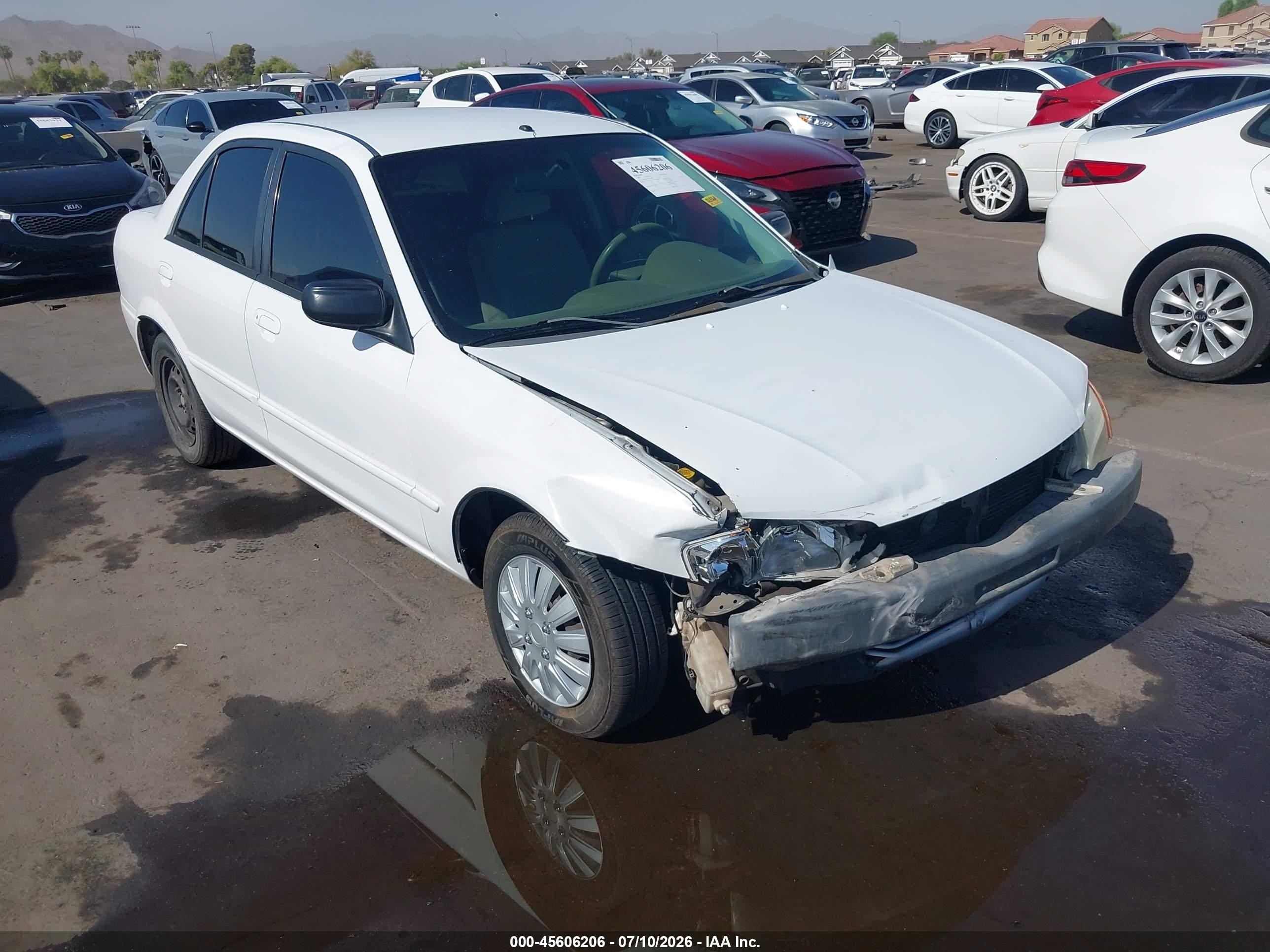 1999 Mazda Protege DX, VIN JM1BJ2225X0133881 — Front end