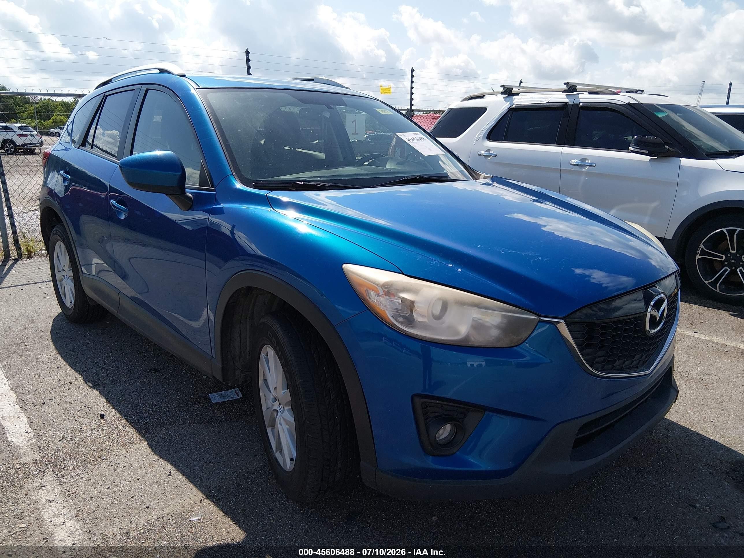 2014 Mazda CX-5 Touring, VIN JM3KE2CYXE0328239 — Water / flood
