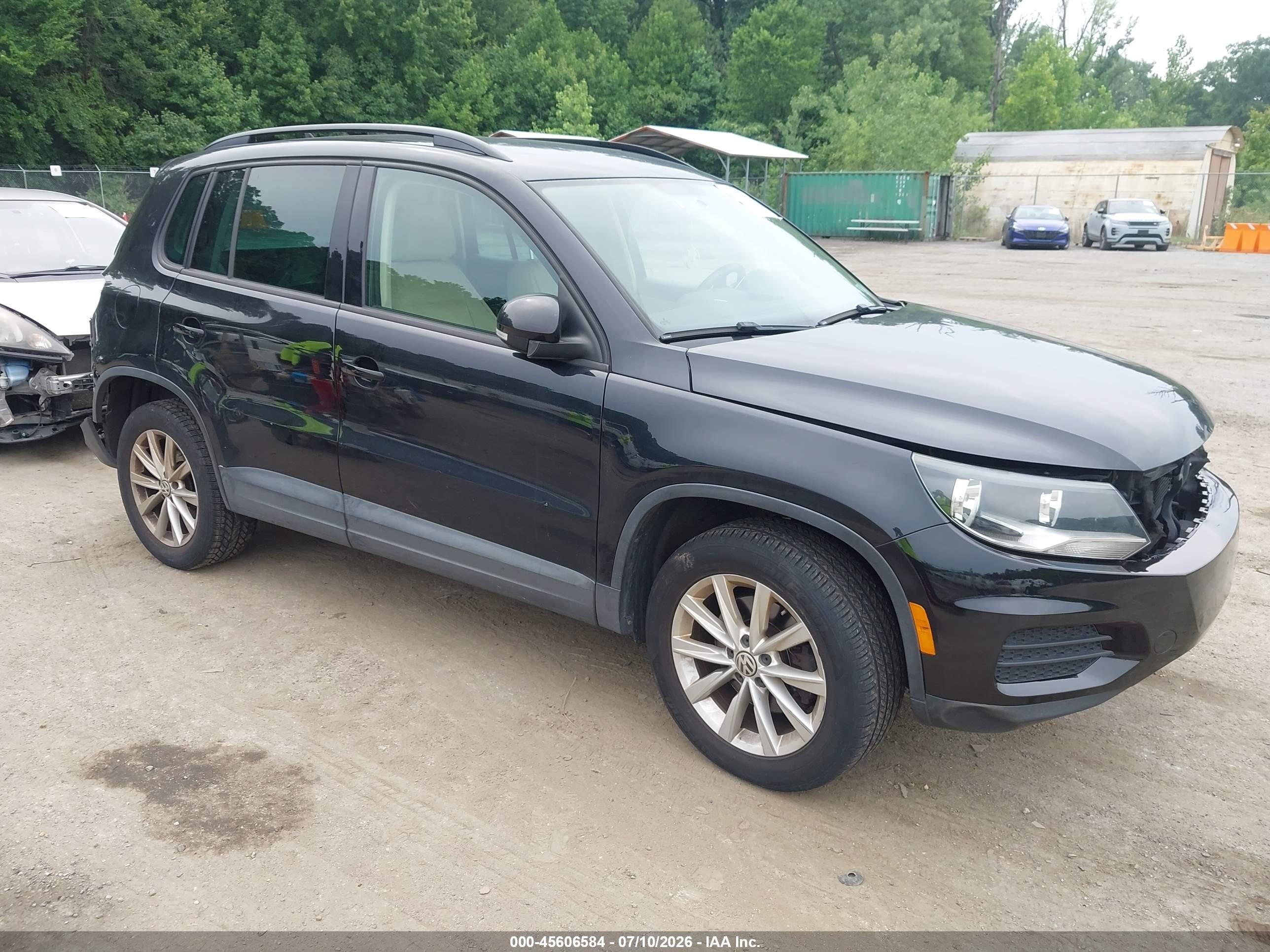 2015 Volkswagen Tiguan SEL, VIN WVGBV7AX1FW503486 — Rear end