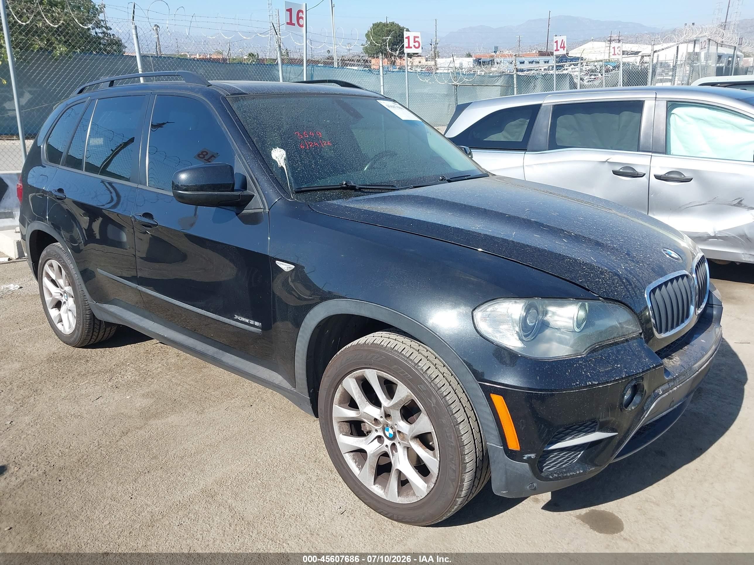 2011 BMW X5 35i, VIN 5UXZV4C51BL402908 — Rear end