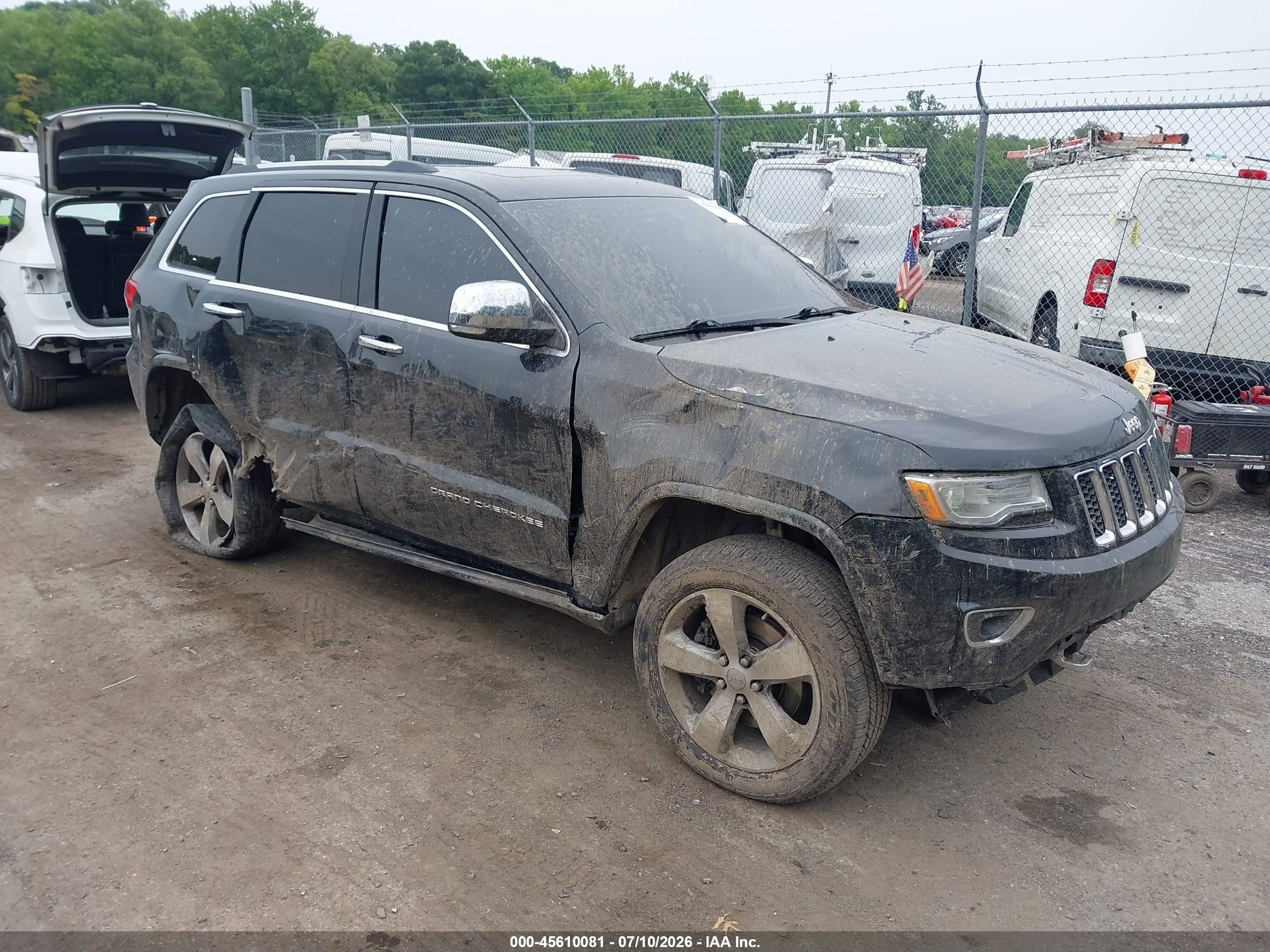 2016 Jeep Grand Cherokee Overland, VIN 1C4RJFCT7GC351266 — Бок