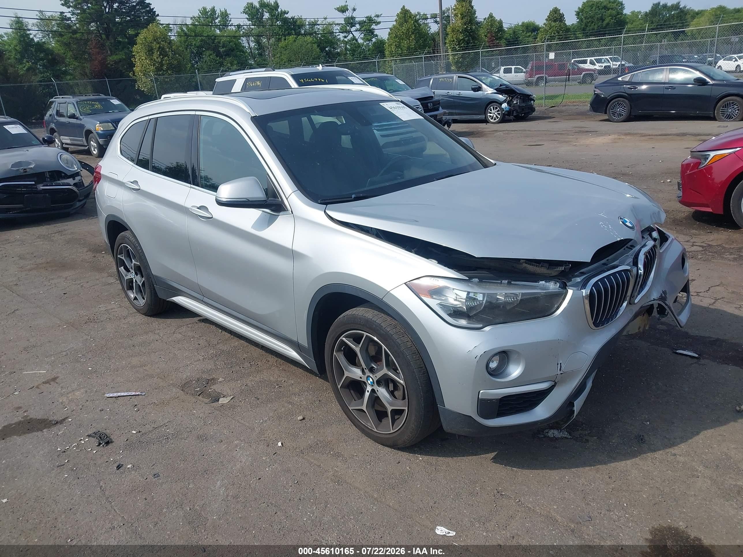 2018 BMW X1 xDrive28i, VIN WBXHT3C32J3H32864 — Front end