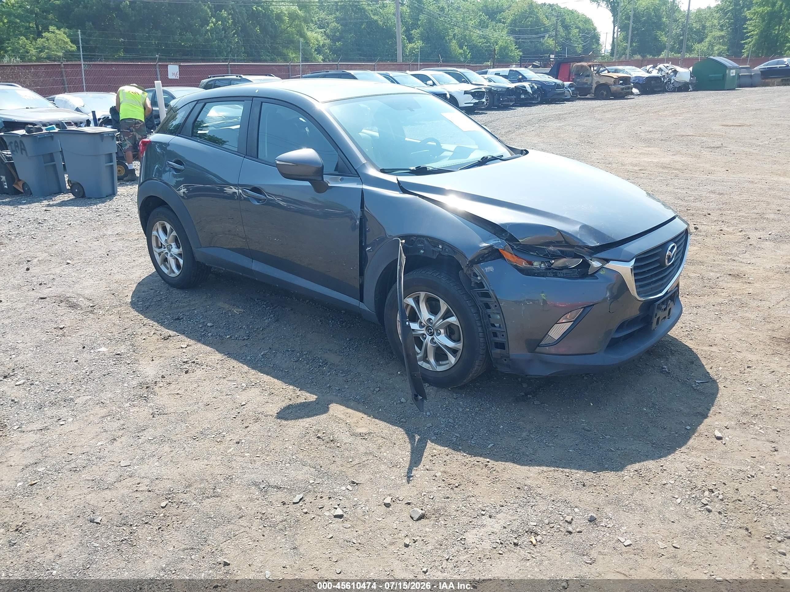 2016 Mazda CX-3 Touring, VIN JM1DKBC7XG0126375 — Side
