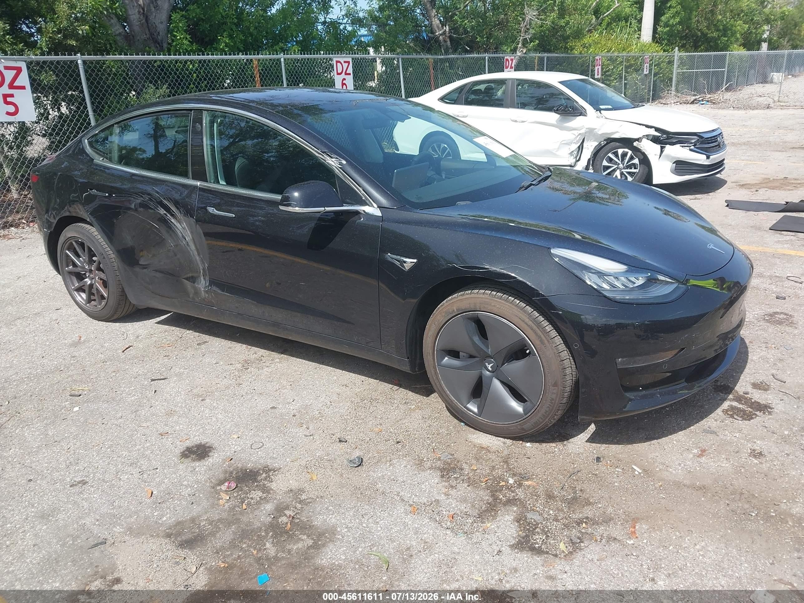 2018 Tesla Model 3 Long Range Battery, VIN 5YJ3E1EA0JF089108 — Side