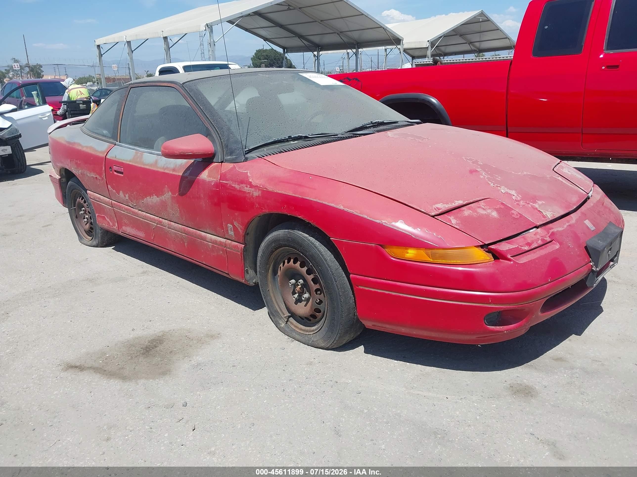 1995 Saturn SC, VIN 1G8ZG1272SZ265420 — Not stated