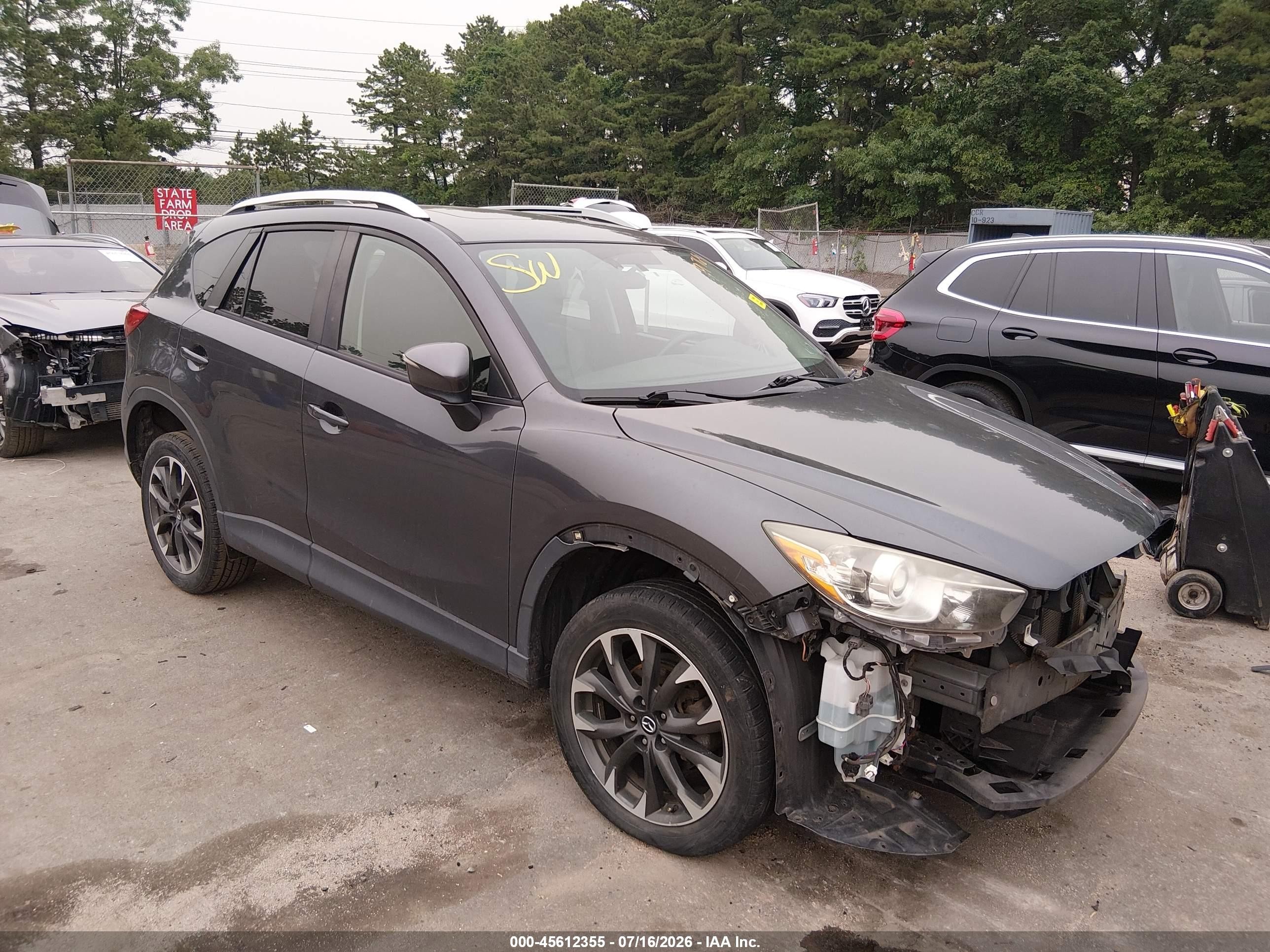 2016 Mazda CX-5 Grand Touring, VIN JM3KE4DY6G0689769 — Front end
