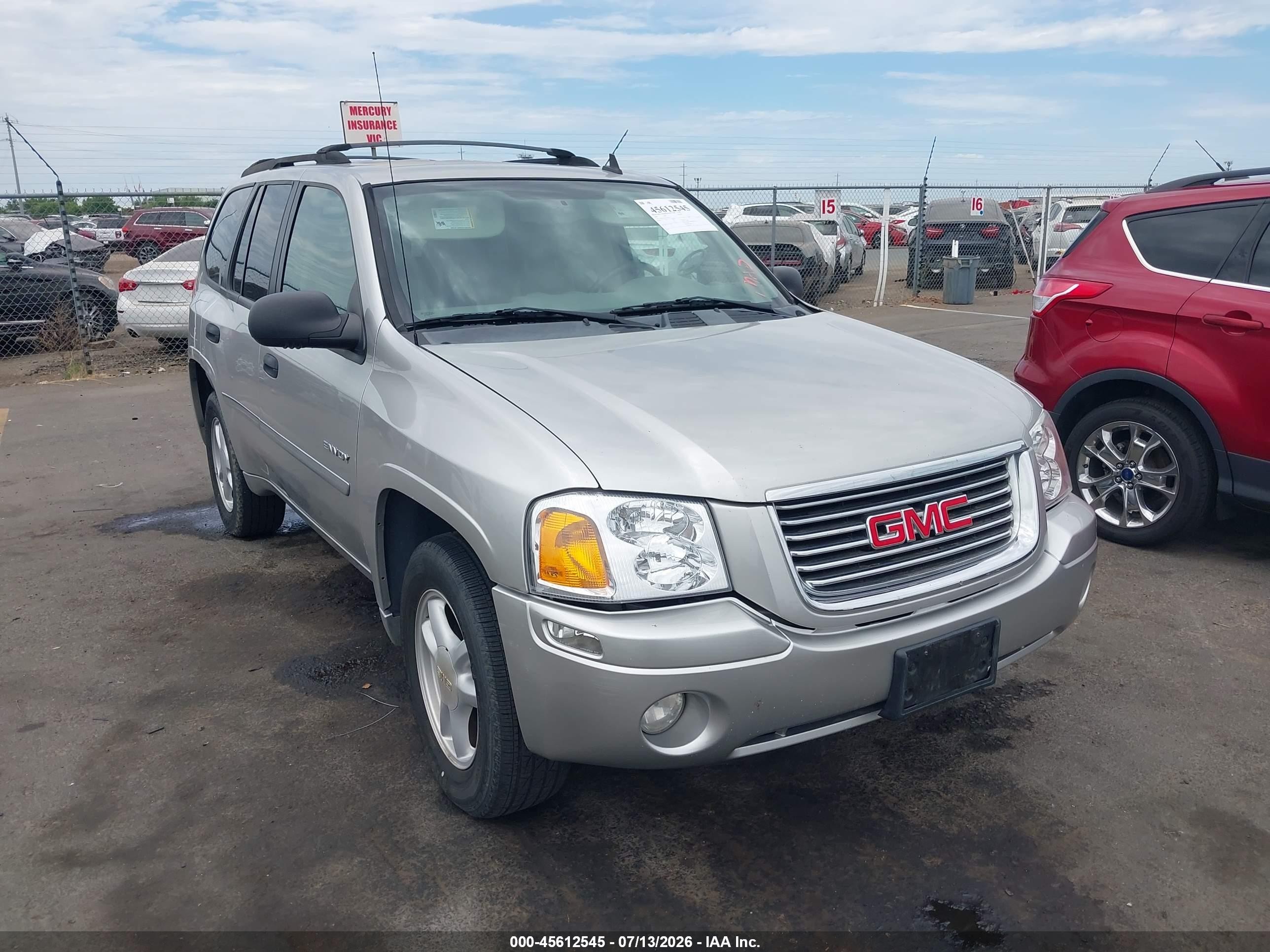 2006 GMC Envoy SLE, VIN 1GKDS13S562150444 — Side