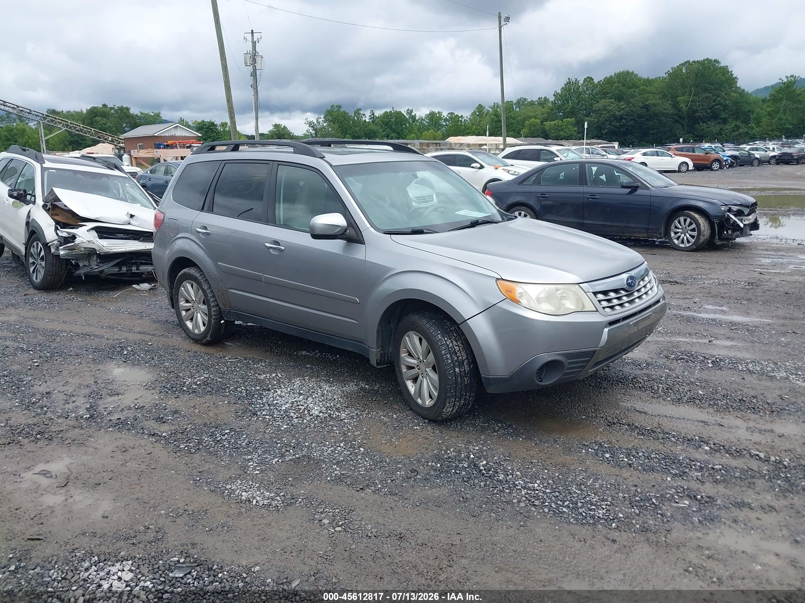 2011 Subaru Forester X Premium, VIN JF2SHADC8BH747301 — Vandalism