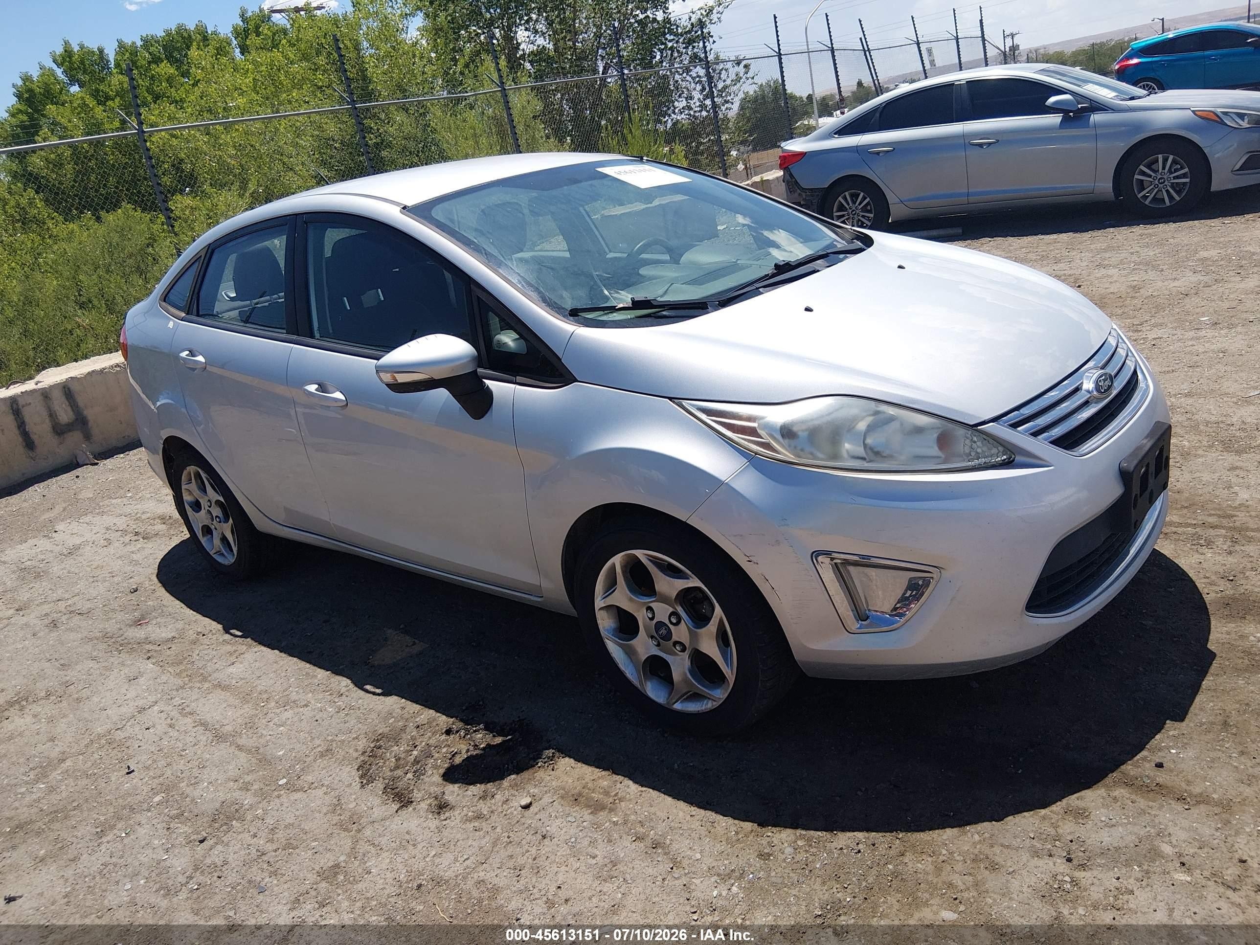 2012 Ford Fiesta SEL, VIN 3FADP4CJXCM173654 — Normal wear